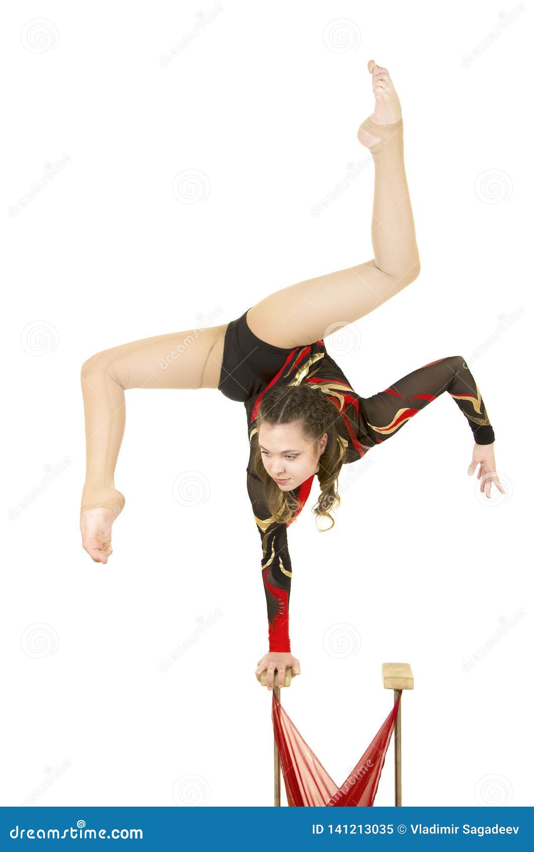 Flexible Equilibrist Performs Exercises on Acrobatic Walking Sticks