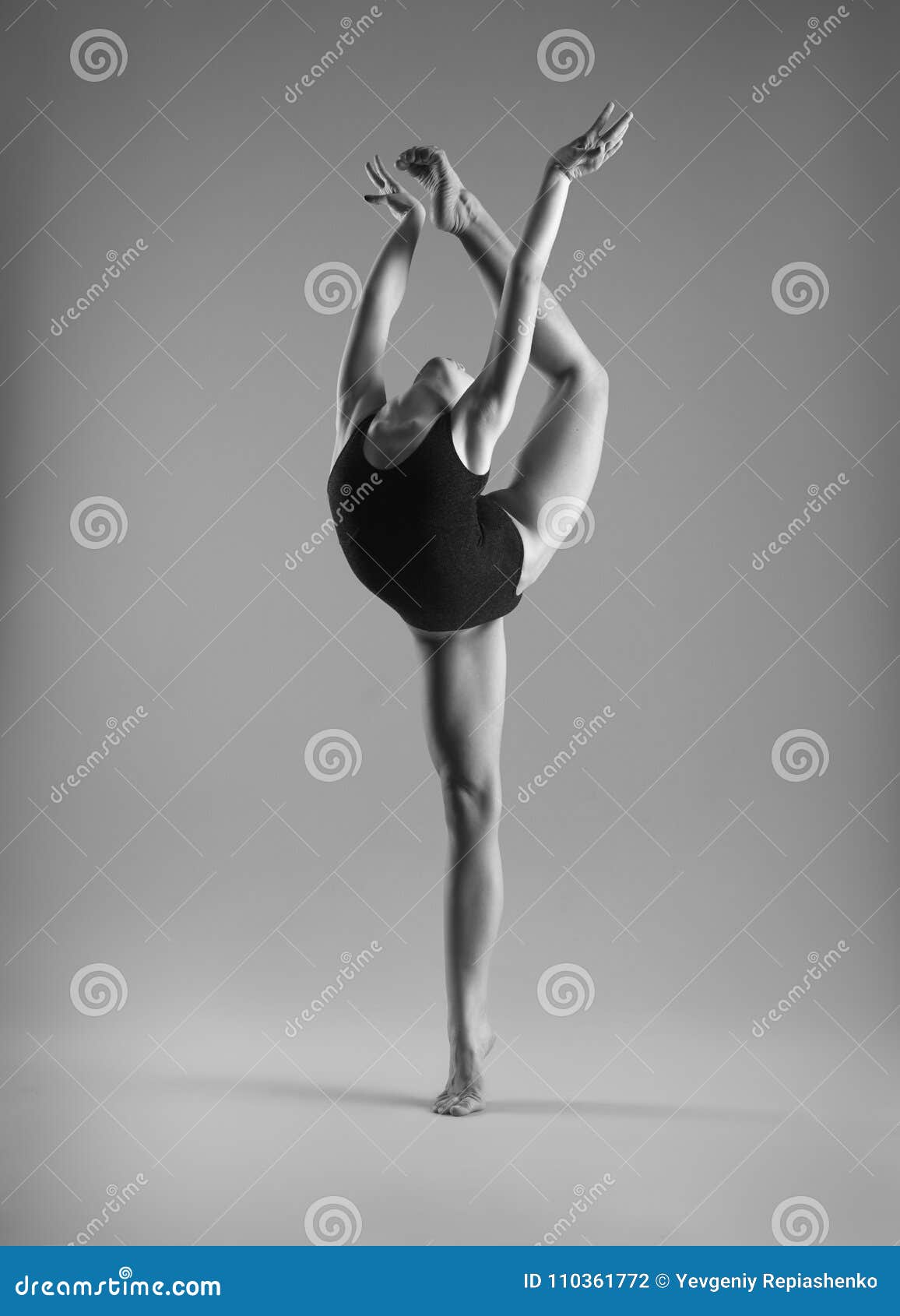 flexible girl in a black swimsuit