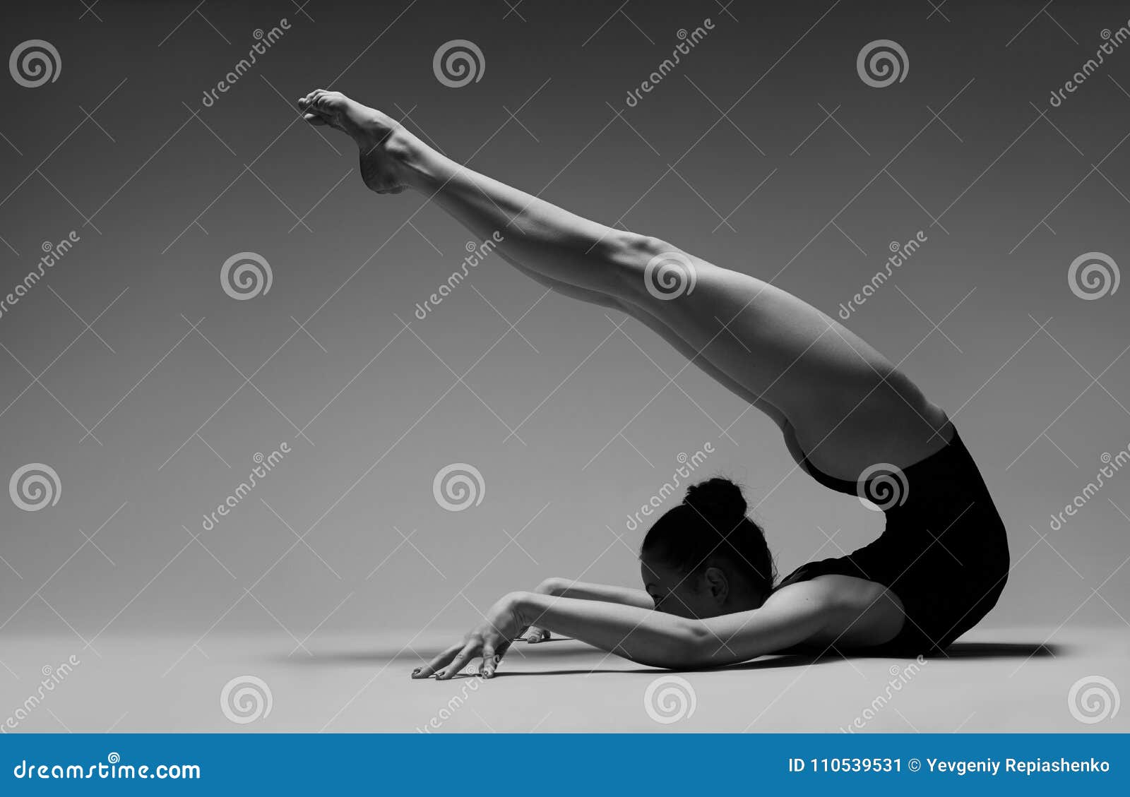 Flexible Girl In A Black Swimsuit Stock Image Image Of Female Black 110539531