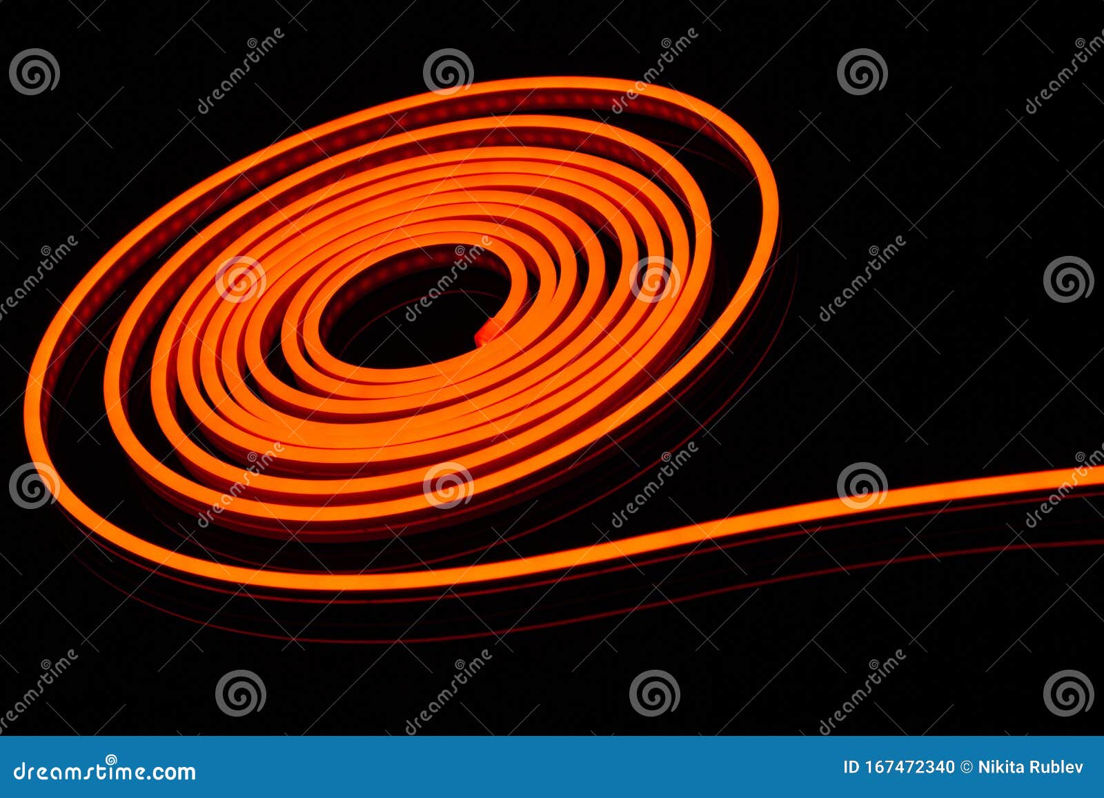 Flexible Orange Led Tape Neon Flex in Roll on Black Background Stock