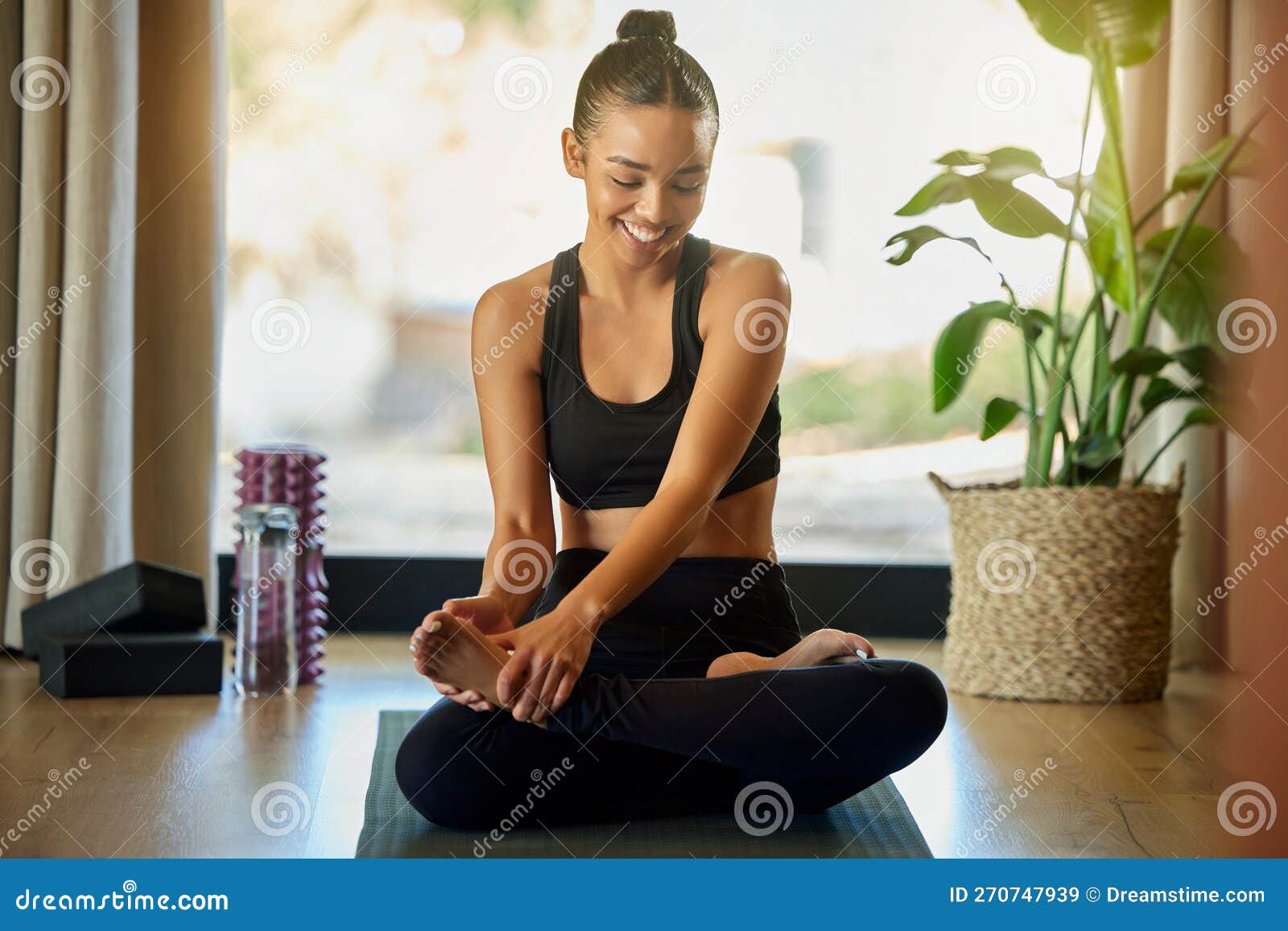 Serene fitness girl does yoga training, sitting in Ardha Padmasana, half lotus  posture, Siddhasana, Accomplished Pose, asana Stock Photo - Alamy