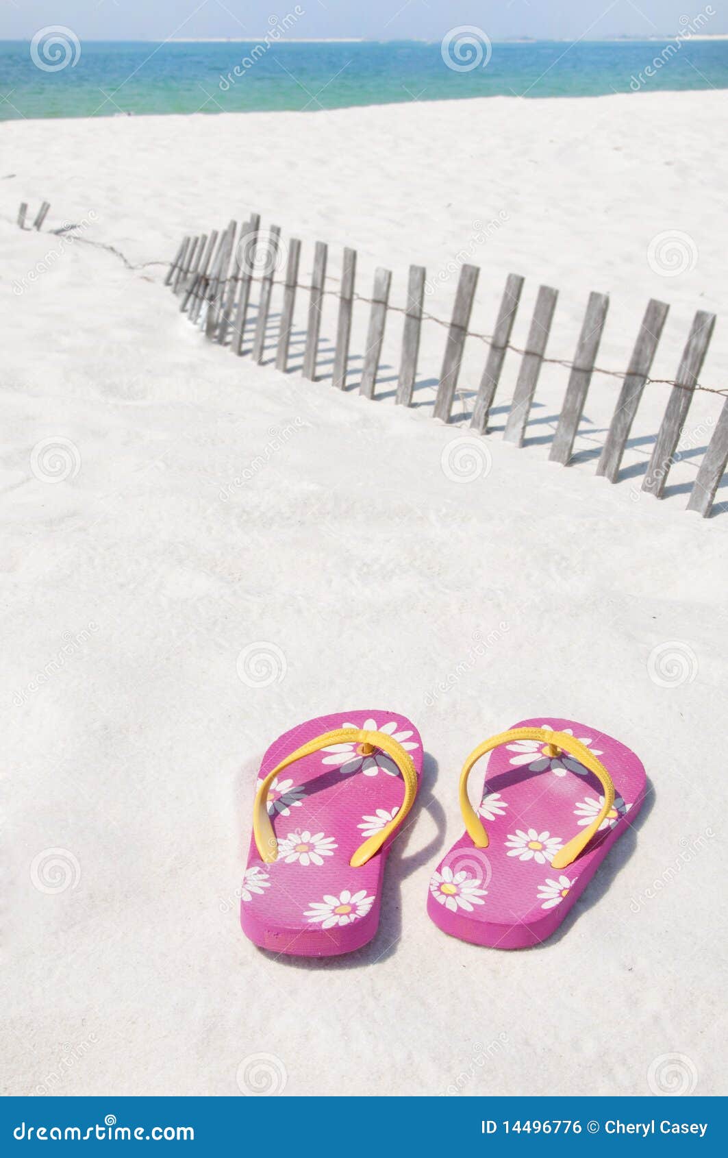 Flip flops at the beach. Flip flops on beautiful white beach