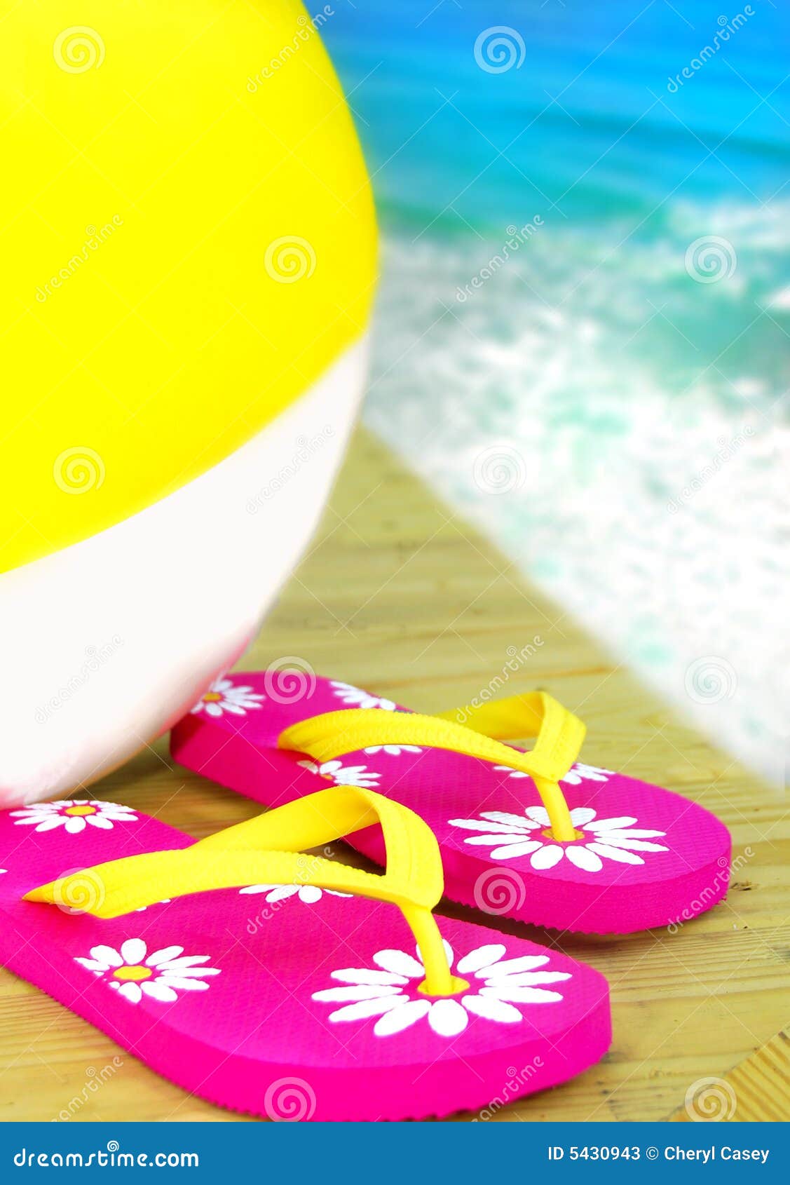 Flip Flops and Beachball by Ocean Stock Image - Image of tropic