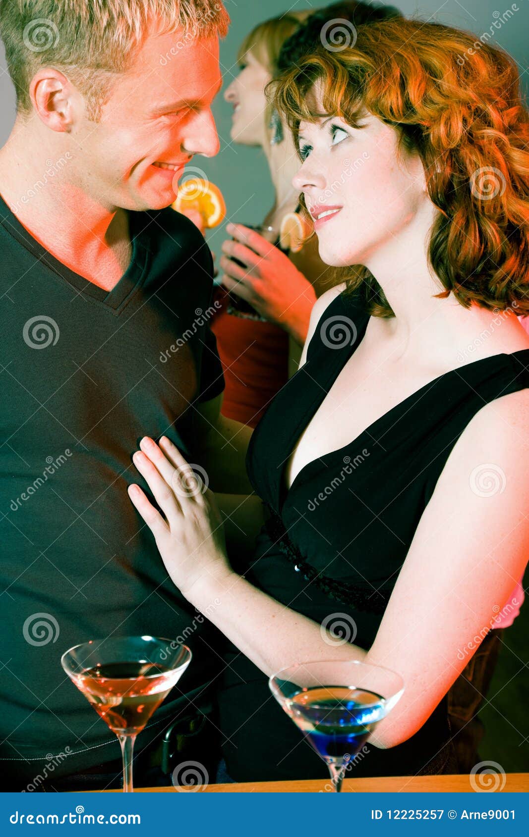 Flirt in a bar stock image. Image of talking, drinking 12225257