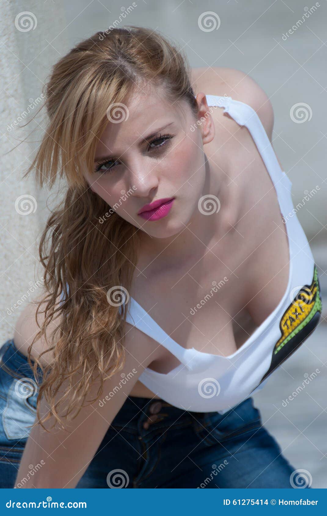 Flirtatious Young Woman in a Cutting Shirt Revealing Her Body Stock Photo -  Image of breasts, fashion: 61275414