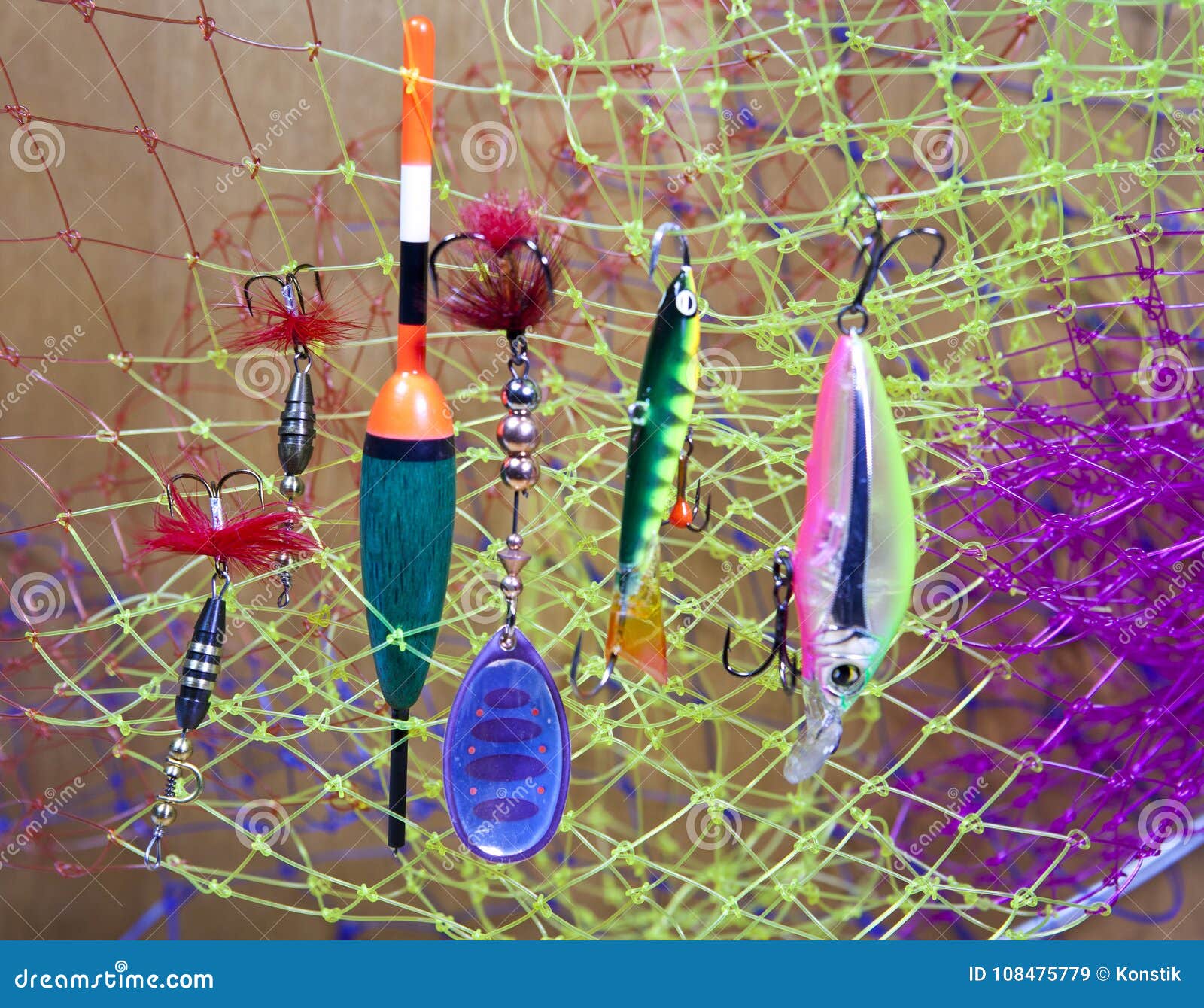 Float and Baits on a Fishing Net Background Stock Image Image of