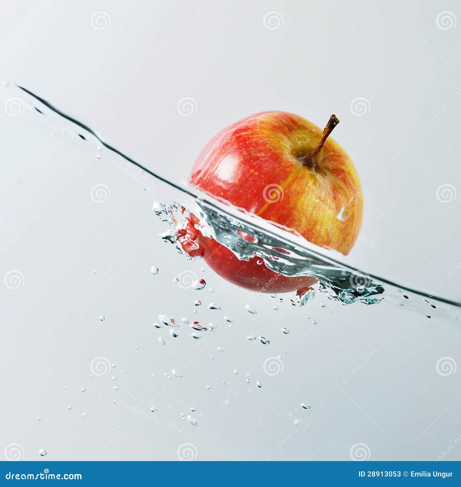 Floating apple stock image. Image of splashing, fresh - 28913053