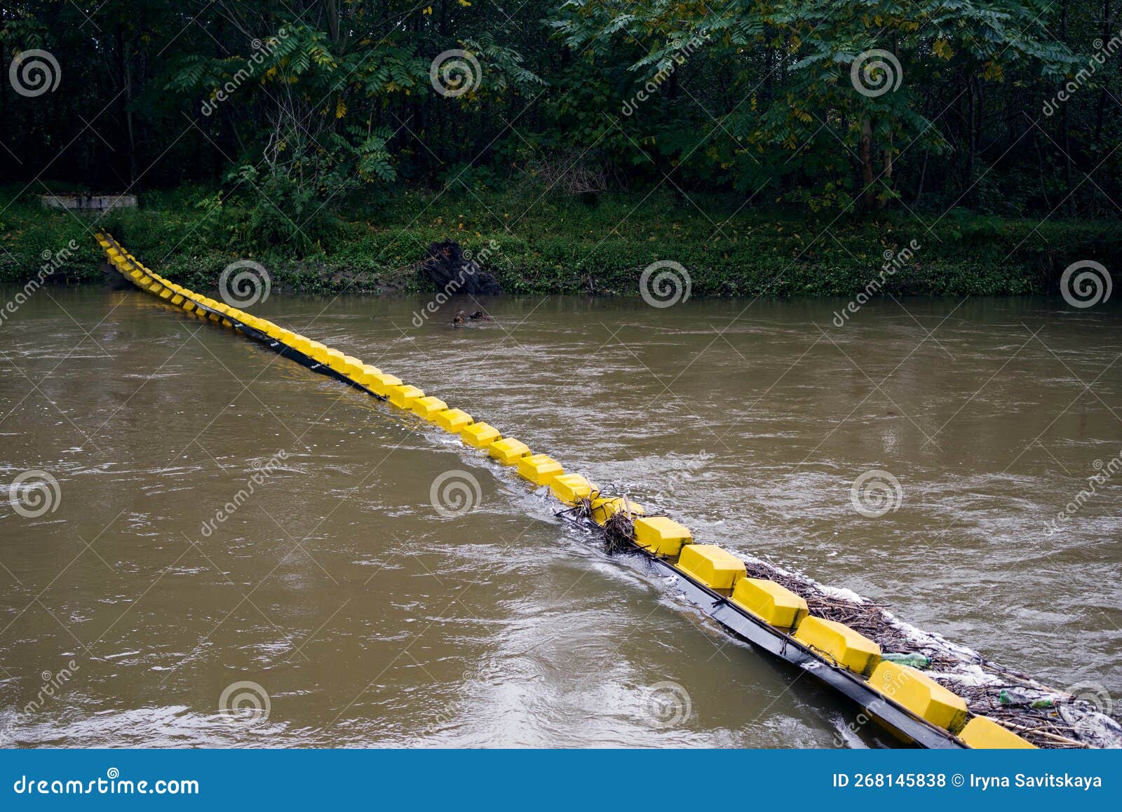 Floating Barrier on the River for Collecting Garbage, Plastic. Stock
