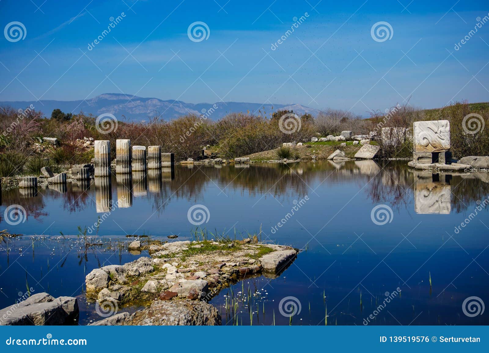 flooded ancient city, miletos, aydin, turkey. columnar reflection