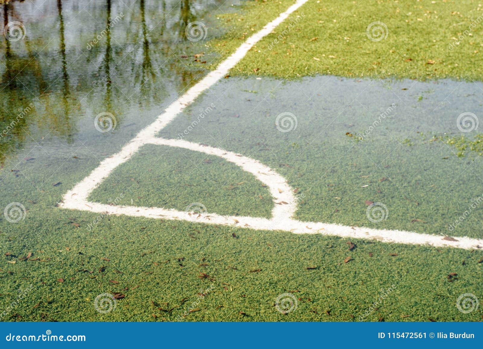 a flooded soccer field after heavy rain