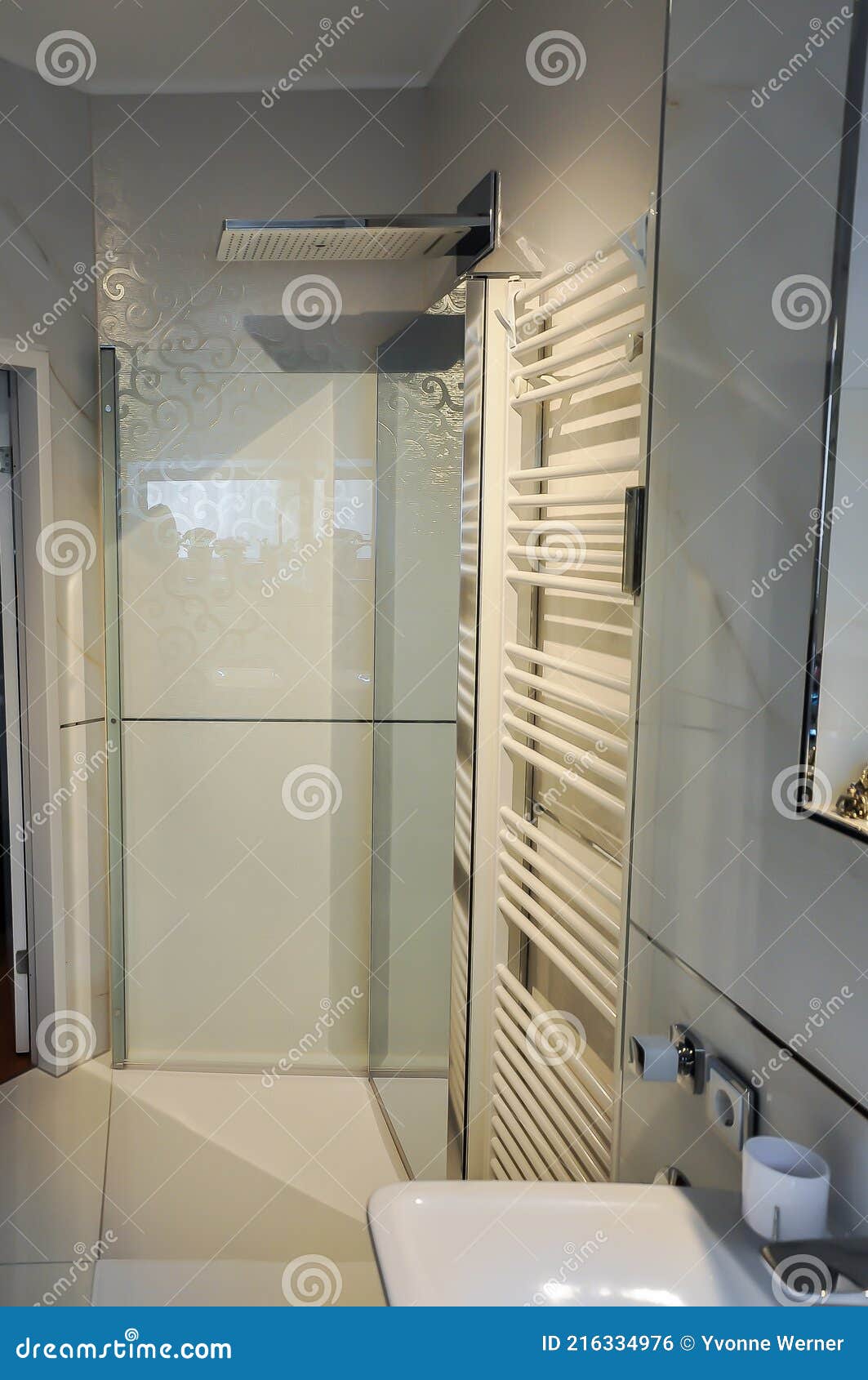 floor-level shower with an exceptionally large overhead showe