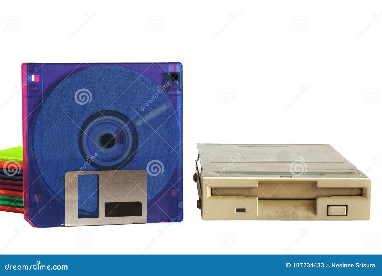 floppy disk drive and diskettes on white background
