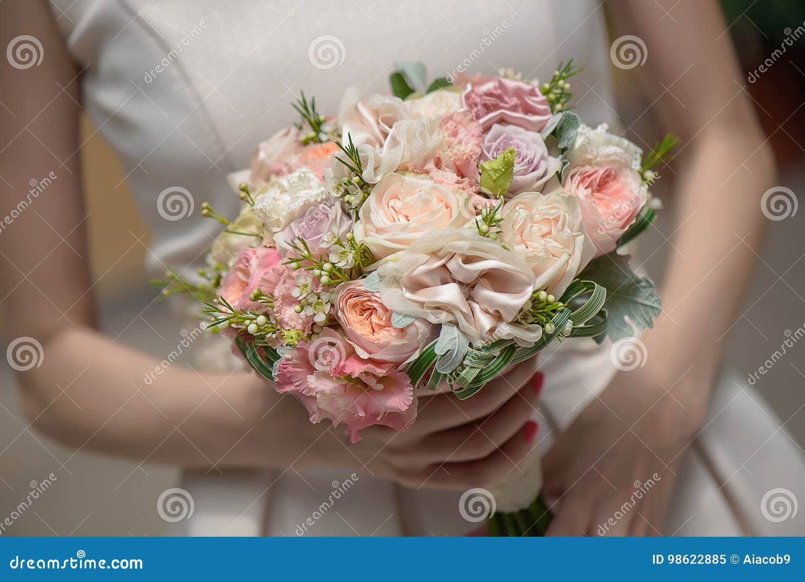 Horizontal Shot of Bride Holding Pastel Colors Roses and Silk Accent ...