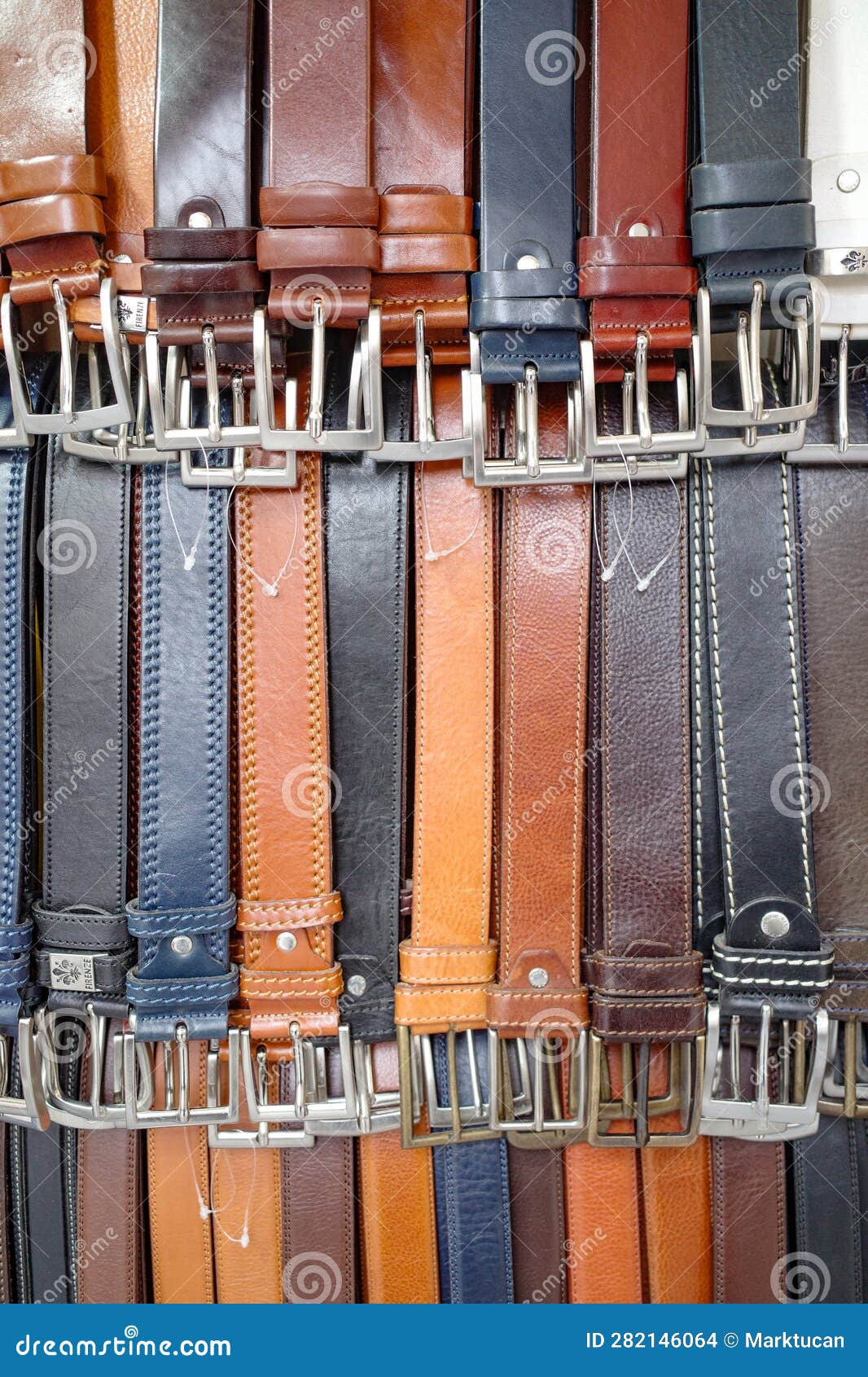 florence, italy - 22 nov, 2022: belts and leathers goods for sale near florence central market