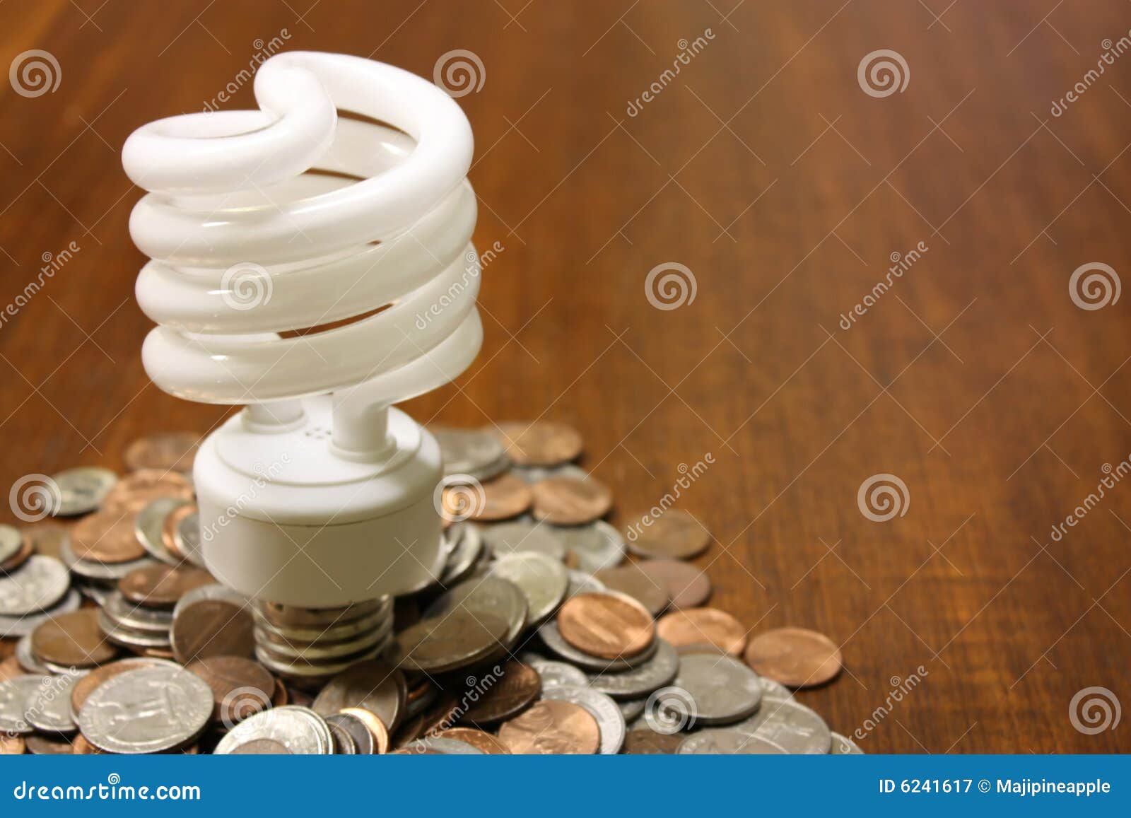 Florescent Light Bulb in Money Stock Image Image of coin, save 6241617