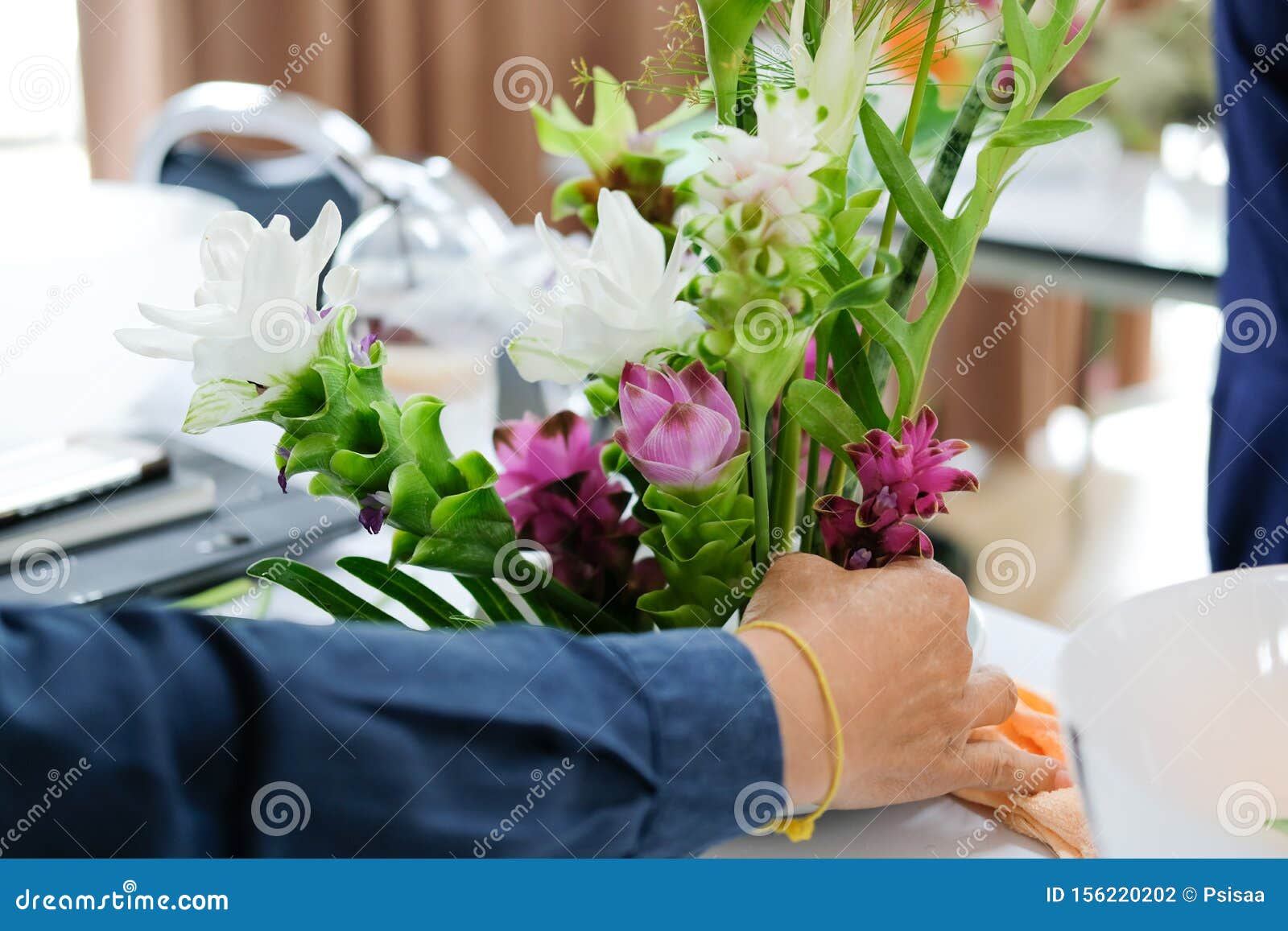 Florist Arranging Flower Bouquet in Vase. Floristry Class Course Florist Arranging Flower Bouquet in Vase. Floristry Class Course