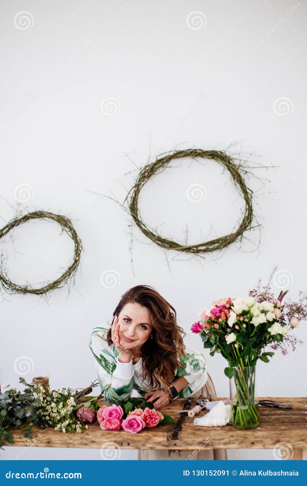 florist makes a bouquet.