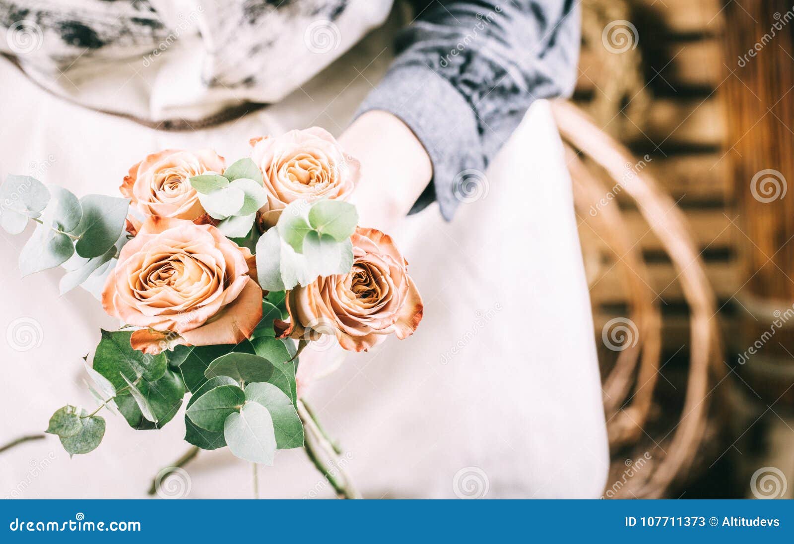 florist at work on arragment flower bouquet