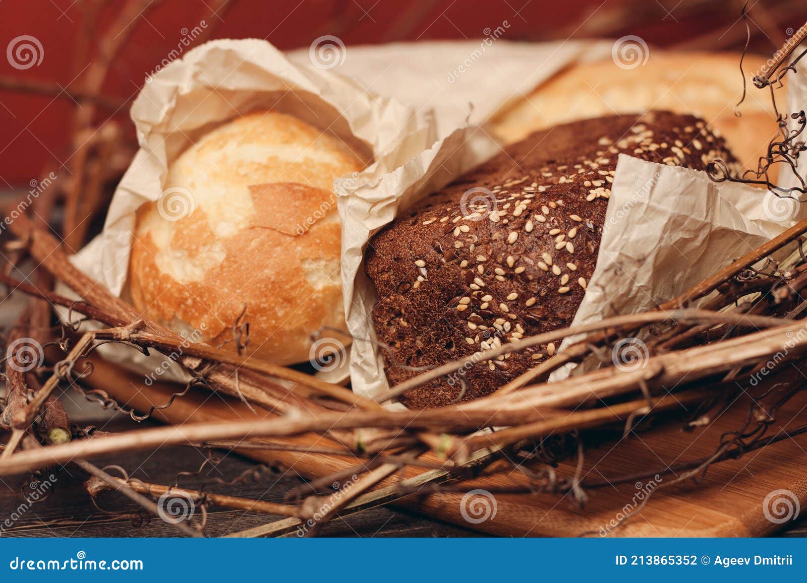 https://thumbs.dreamstime.com/z/flour-product-loaf-bread-baked-goods-branches-nest-close-up-flour-product-loaf-bread-baked-goods-213865352.jpg