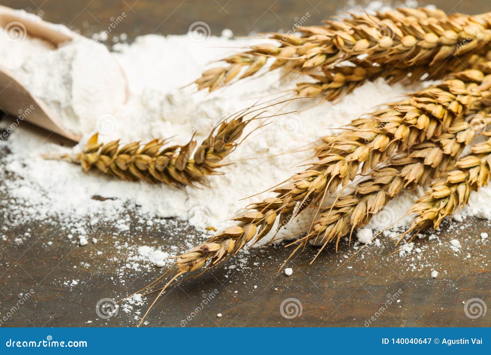 Flour and a wooden spoon stock image. Image of pile 140040647