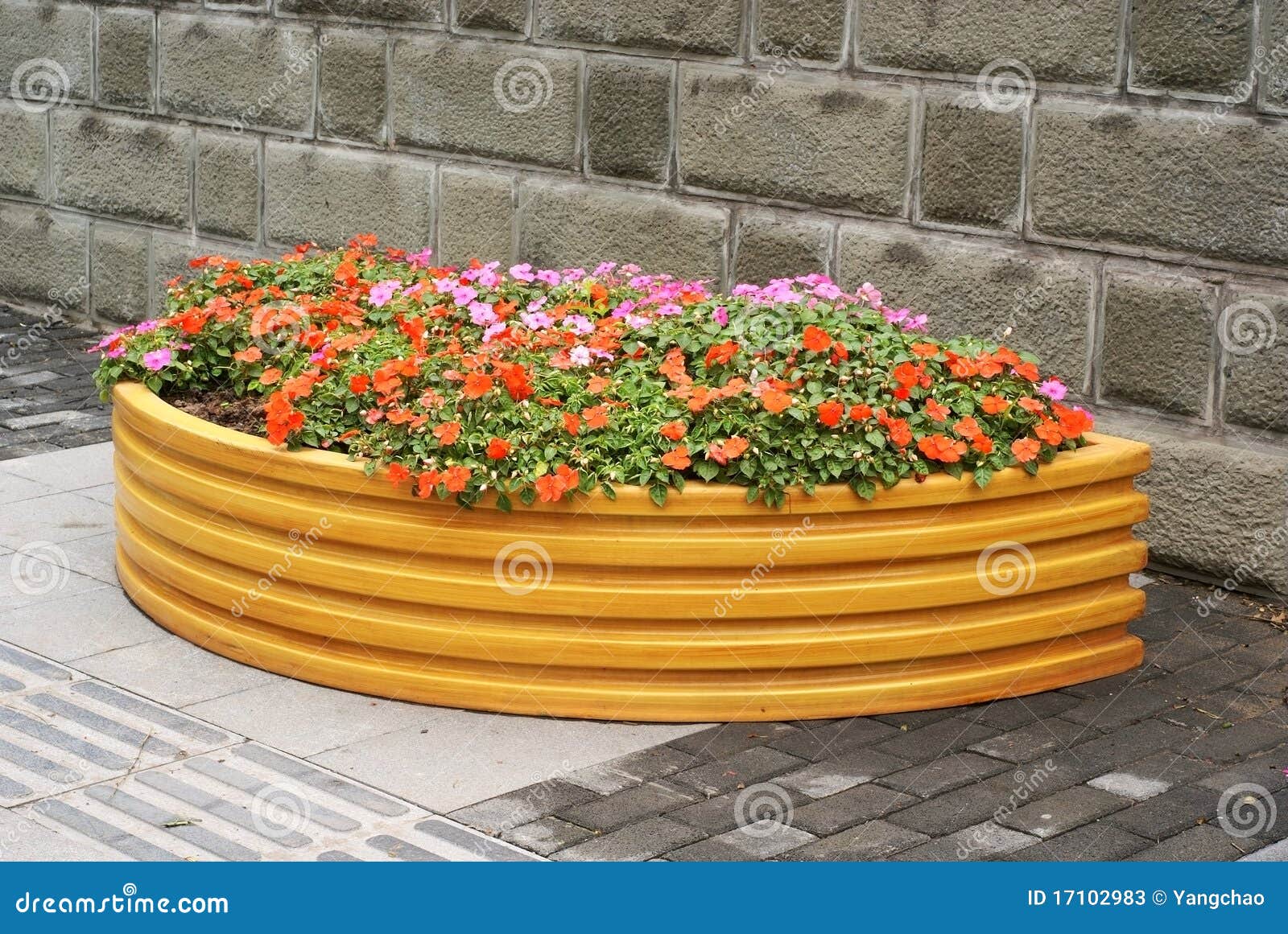 Flower bed with wall stock image. Image of walls, botanical 17102983