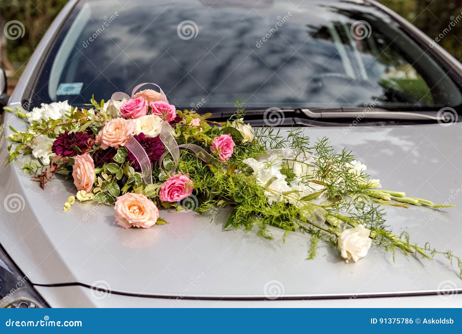 Flower Decoration and a Ring Set on Gray Wedding Car Stock
