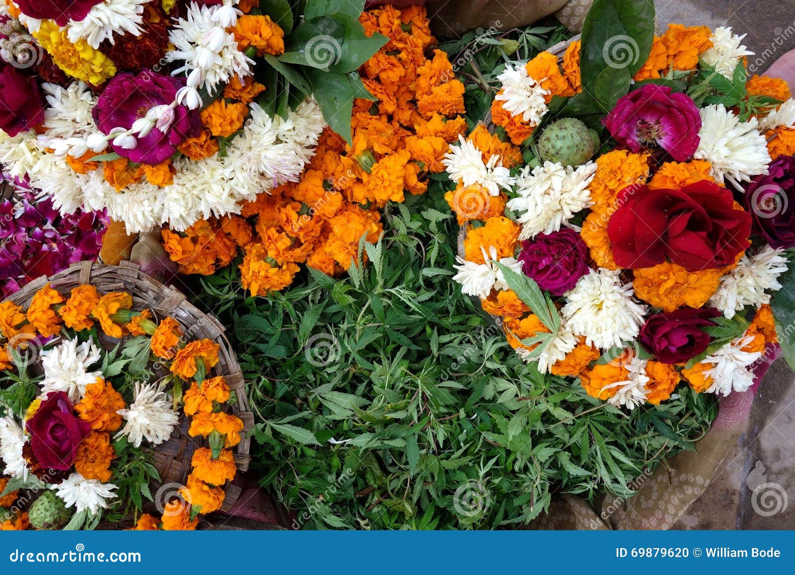 flower offerings to shiva shot being sold outside temple ayodhya north india pilgrims buy then offer 69879620