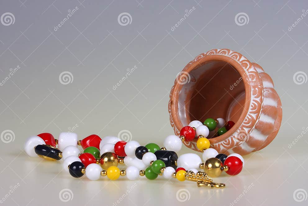 Flowerpot and beads stock image. Image of decoration 4591405