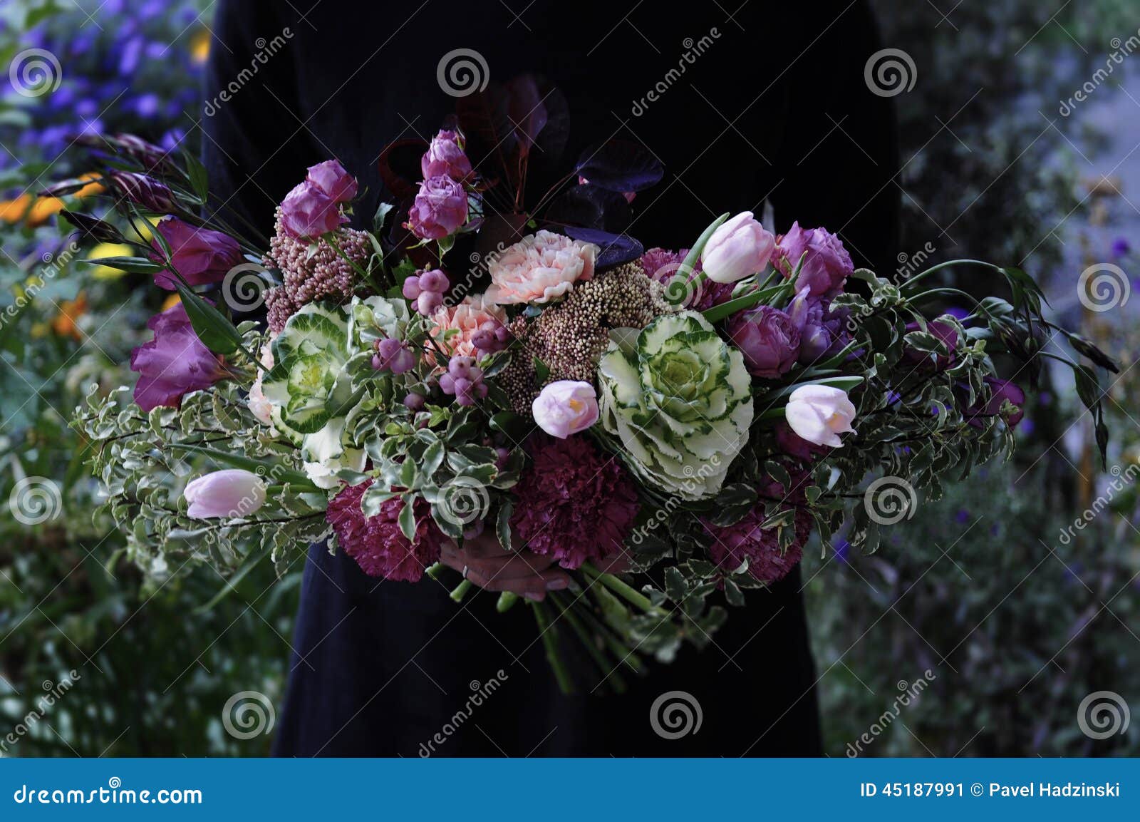 flower wedding arrangement with ranunculus, pion, roses