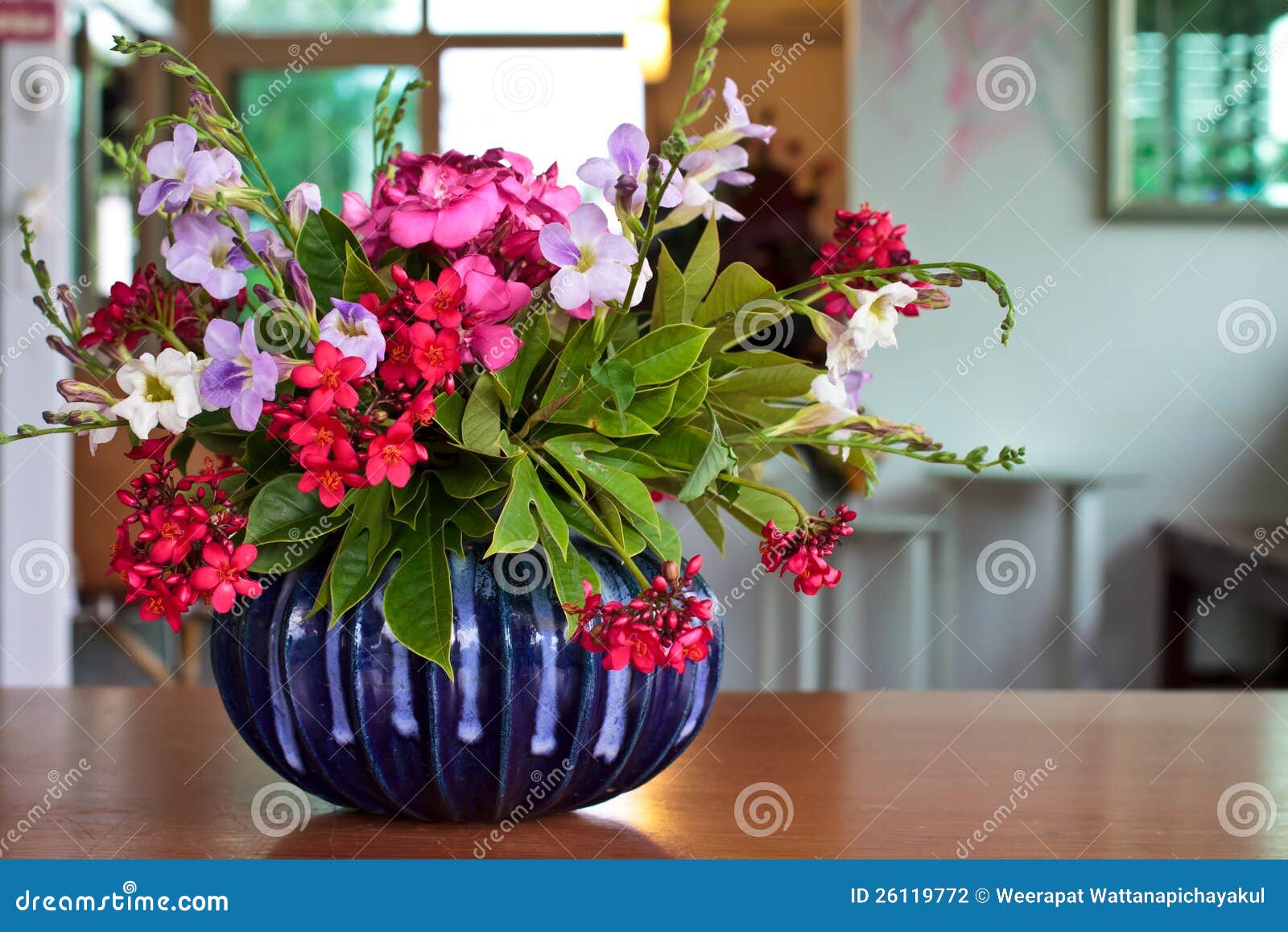 Flowers in blue vase stock photo. Image of interior, floral 26119772