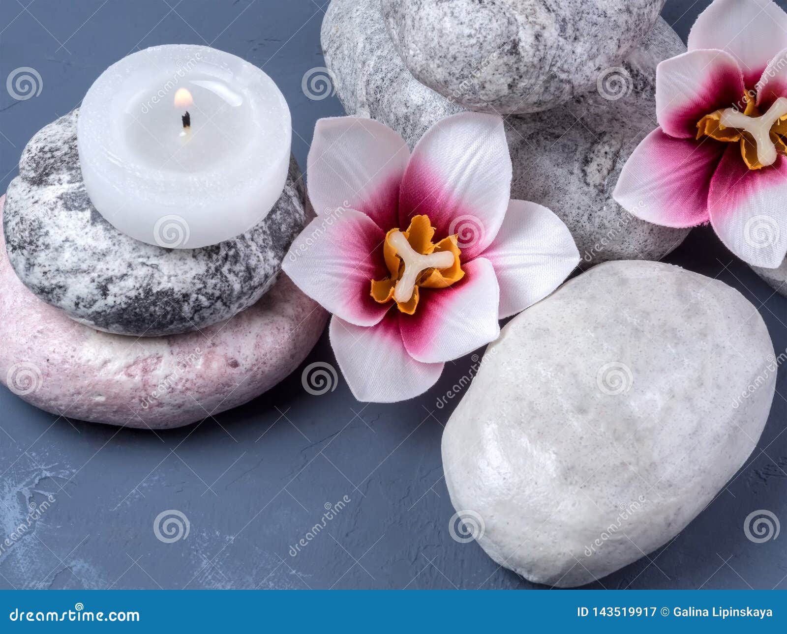 Flowers, Burning Candle and Stone for Spa. Spa Composition Stock Image