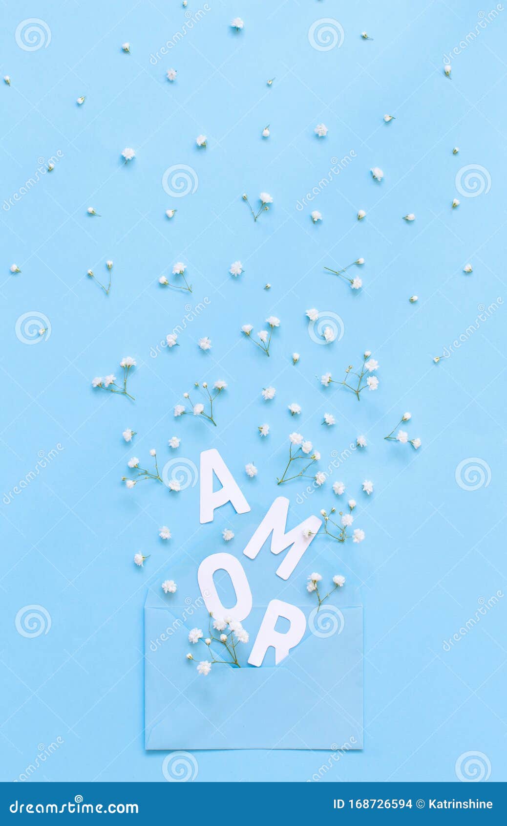 flowers, envelope and text  amor on a light blue background