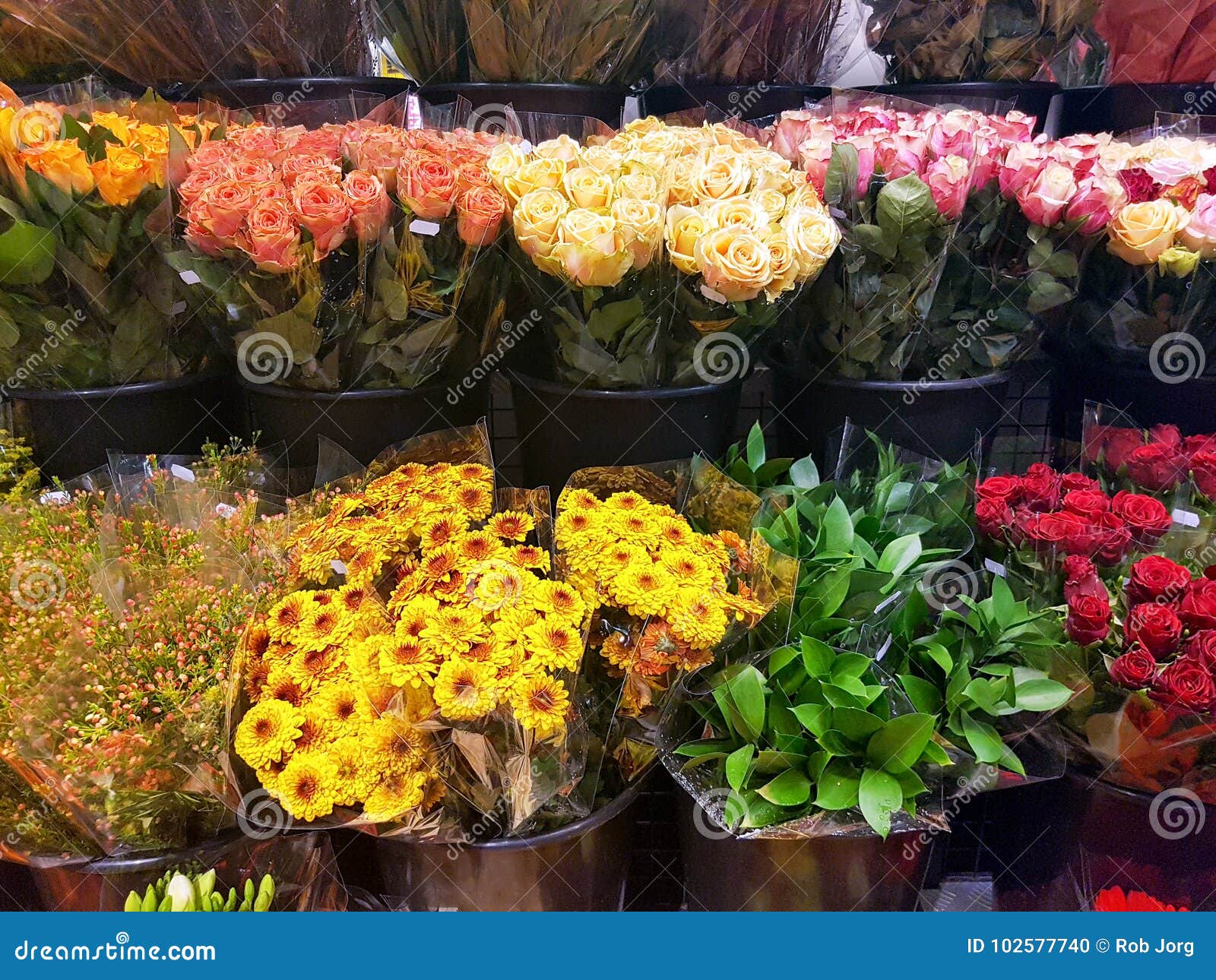 Flowers in a flower shop stock photo. Image of yellow - 102577740