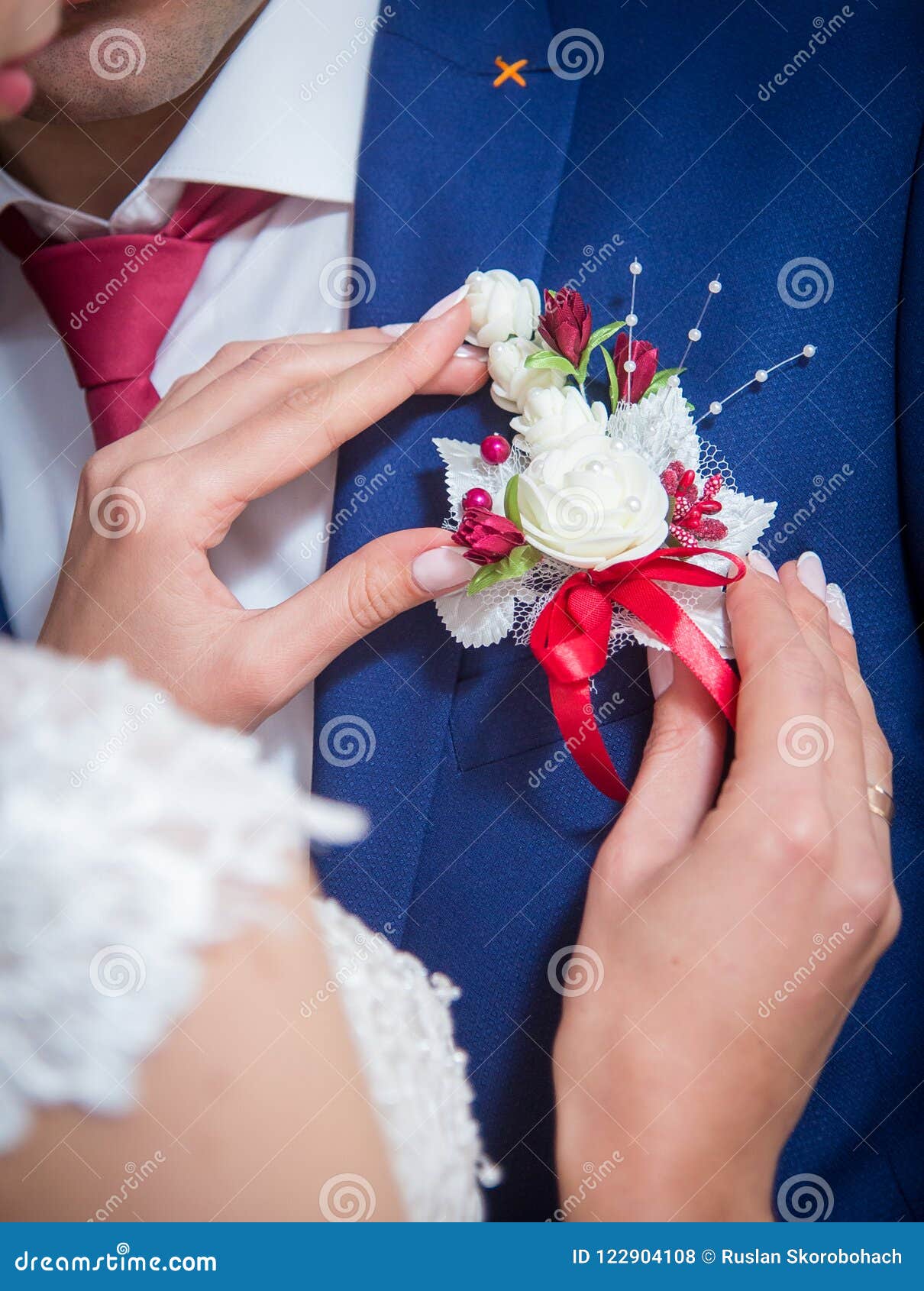 Flowers in a man`s jacket. stock photo. Image of bride 122904108