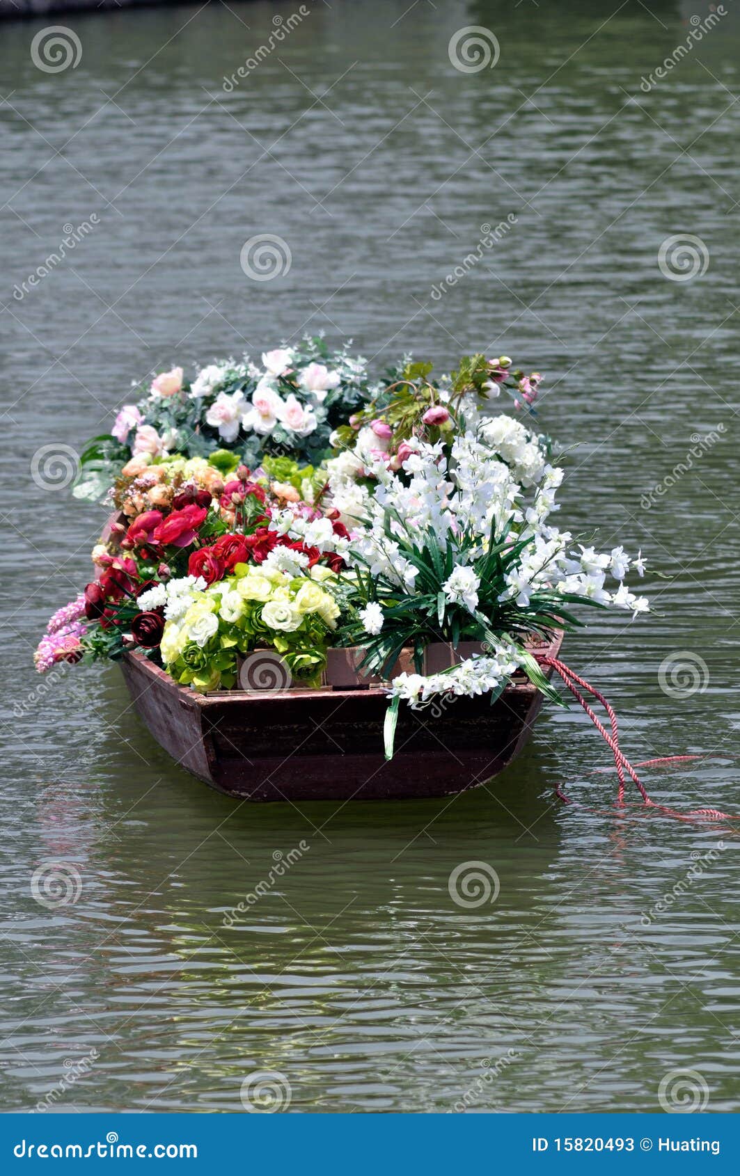 Flowers in old boat stock image. Image of quaint, colorful ...