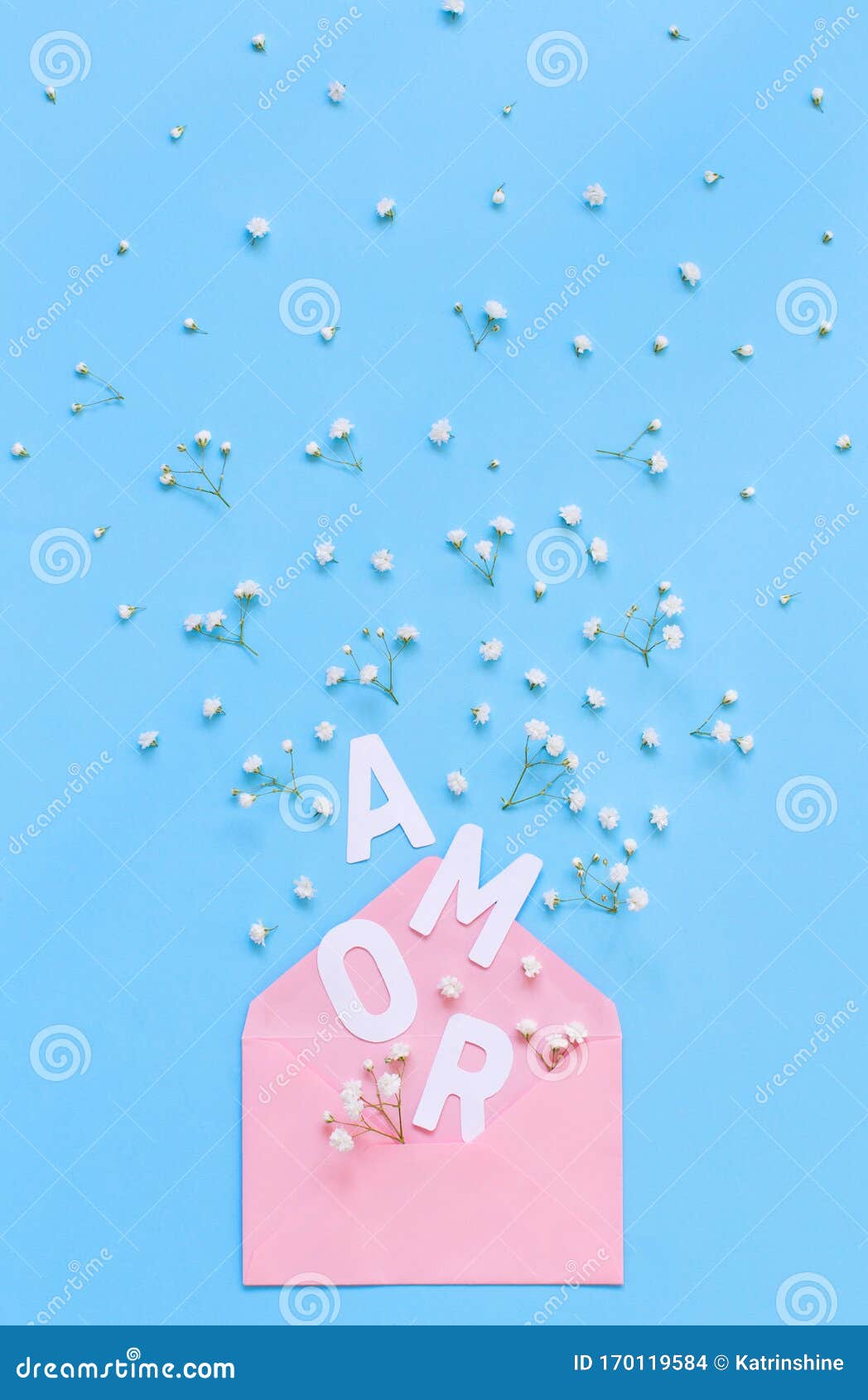 flowers, pink envelope and word amor on a light blue background