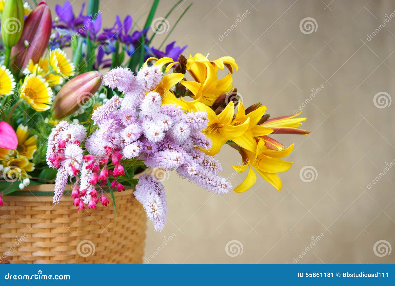 Flowers in a wicker basket stock image. Image of group 55861181