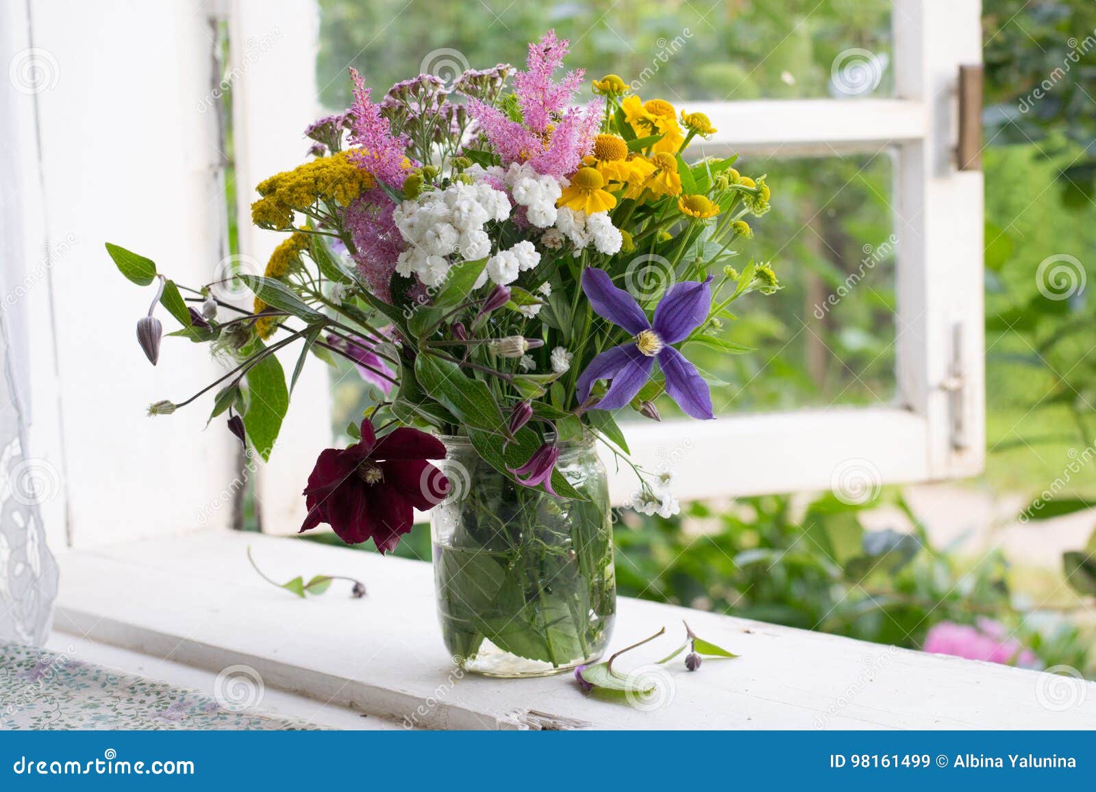 Flowers on windowsill stock image. Image of beauty, house 98161499