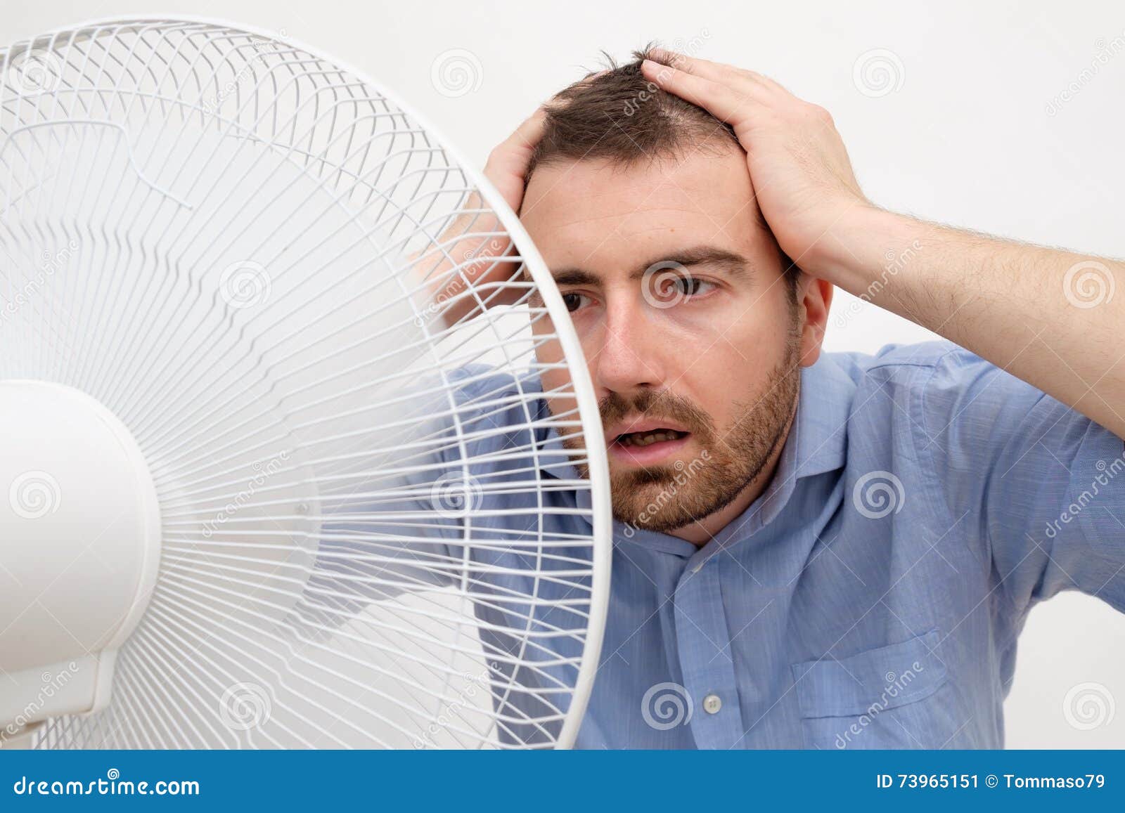 Flushed man feeling hot stock image. Image of heatwave 73965151