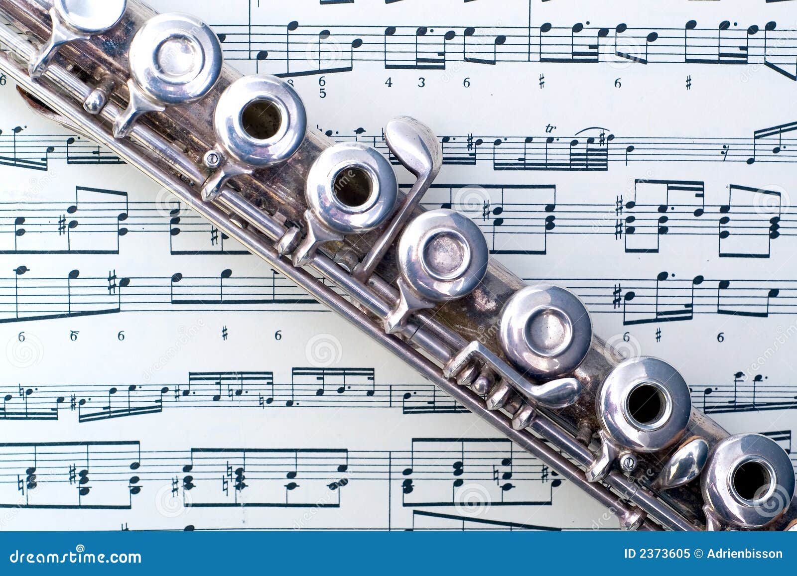 A flute on sheet music stock image. Image of sound, artistry - 2373605