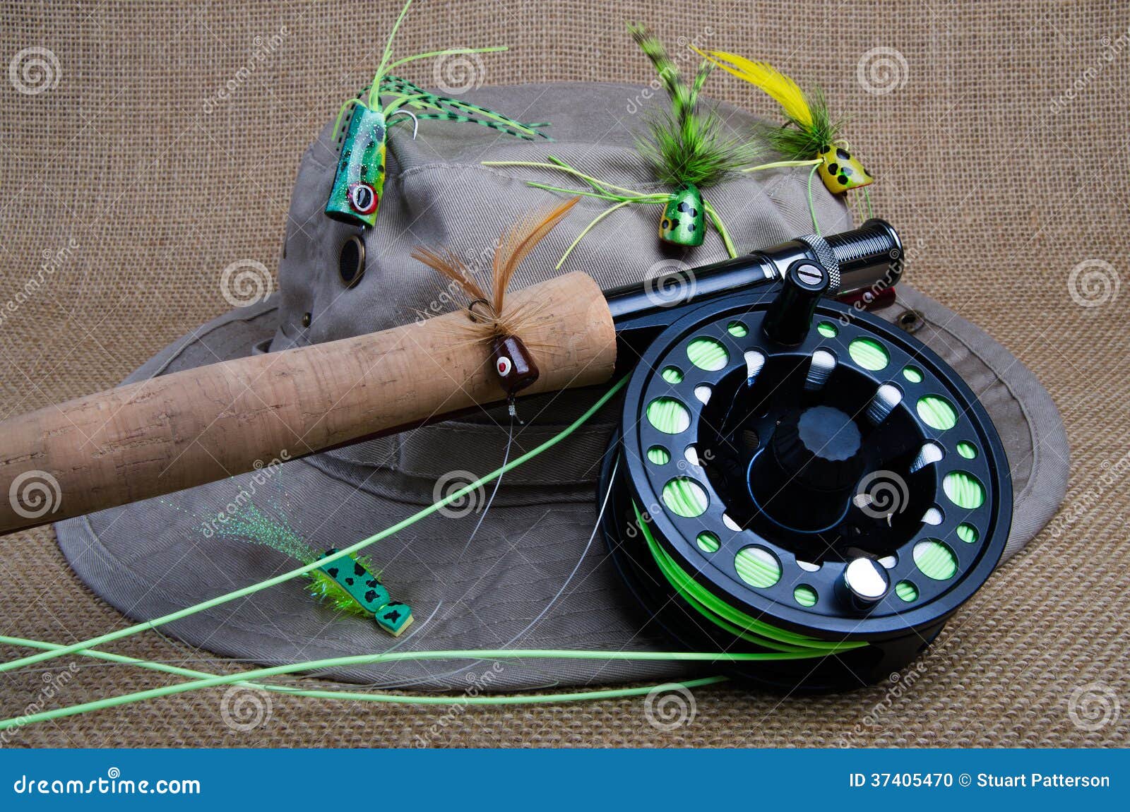 https://thumbs.dreamstime.com/z/fly-fishing-bass-hat-covered-flies-rod-reel-ready-to-fish-37405470.jpg