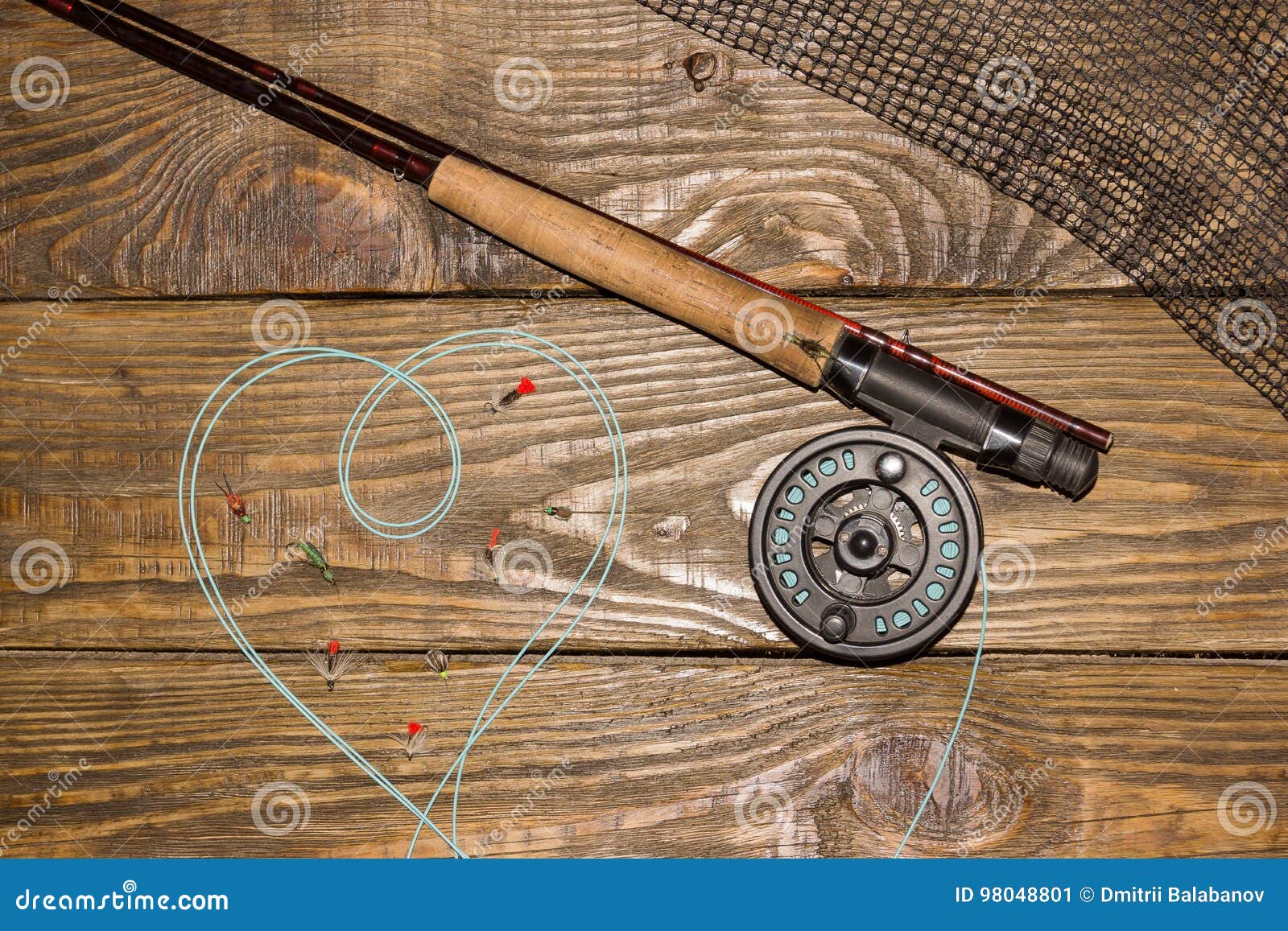 Fly Fishing Rod ,flie and a Landing Net on the Old Wooden Table. All Ready  for Fishing. Stock Image - Image of reel, fresh: 98048801