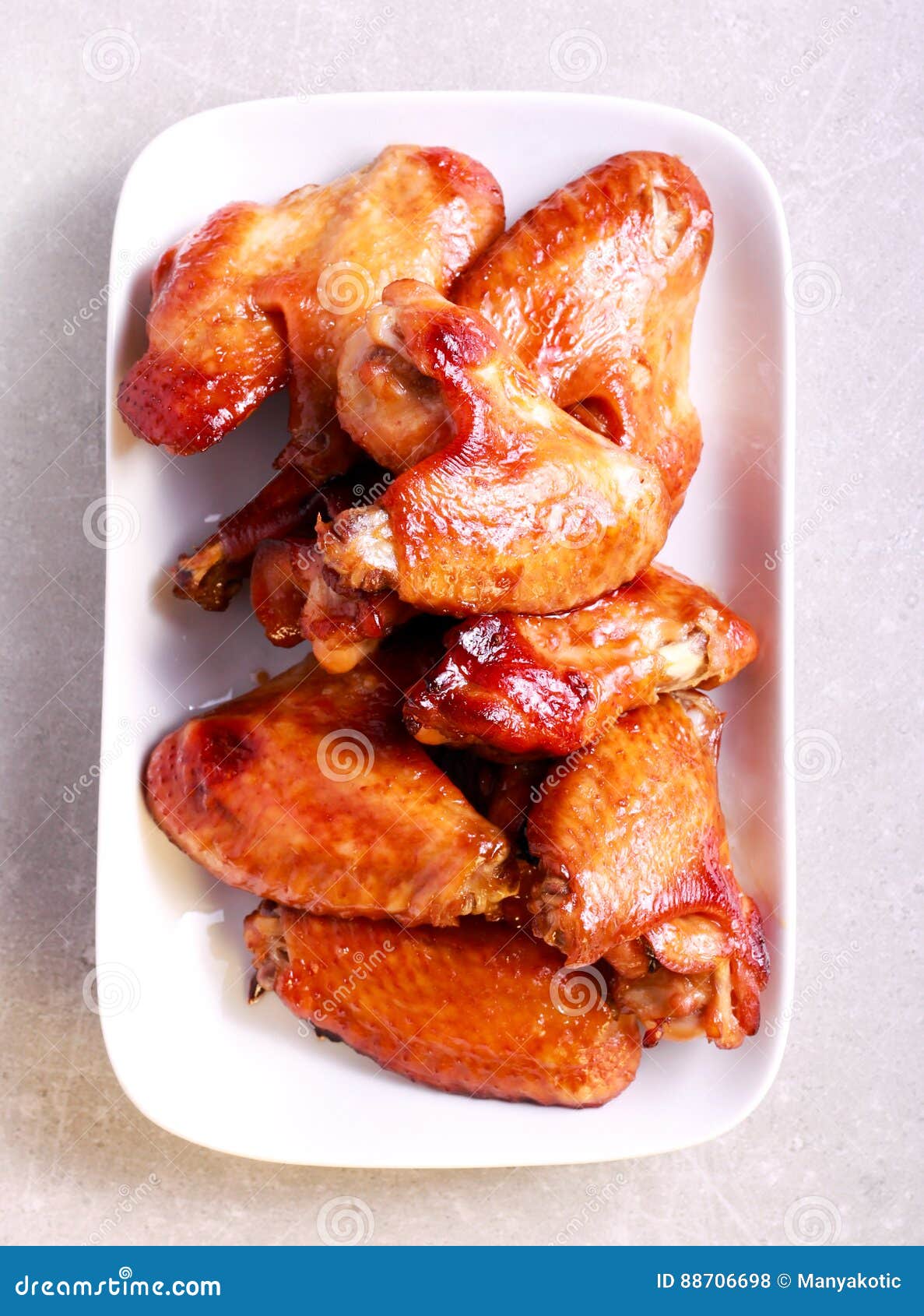 Flying Chicken Wings on Plate Stock Photo Image of chicken, baked