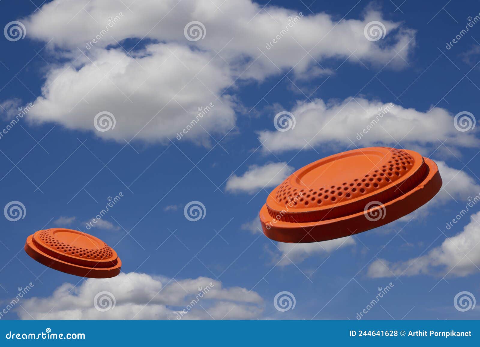 Flying Clay Pigeon Target in the Blue Sky Background , Shotgun Shooting Game Stock Photo