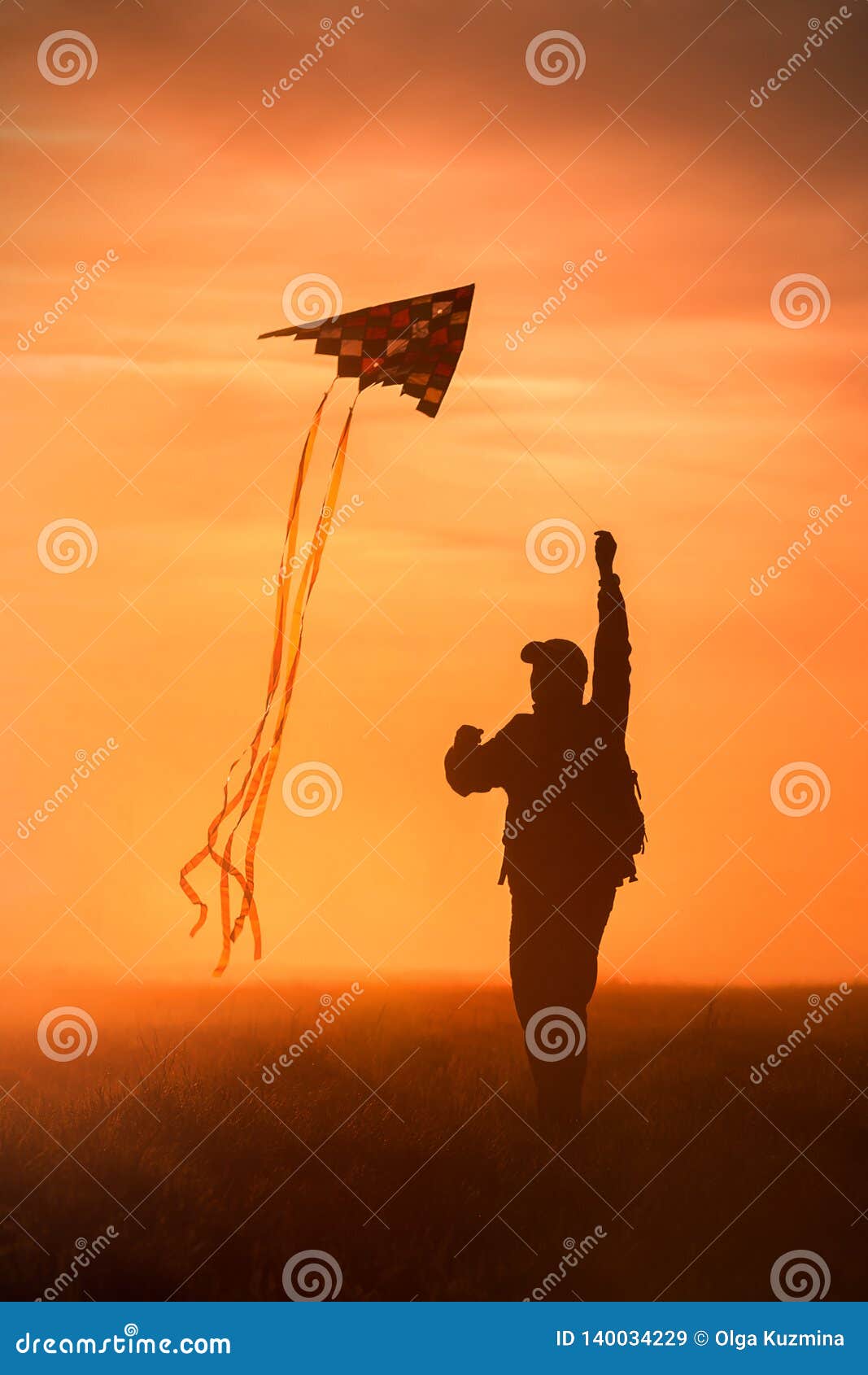 Flying a Kite. Silhouette of a Man with a Kite Against the Sky. Bright ...