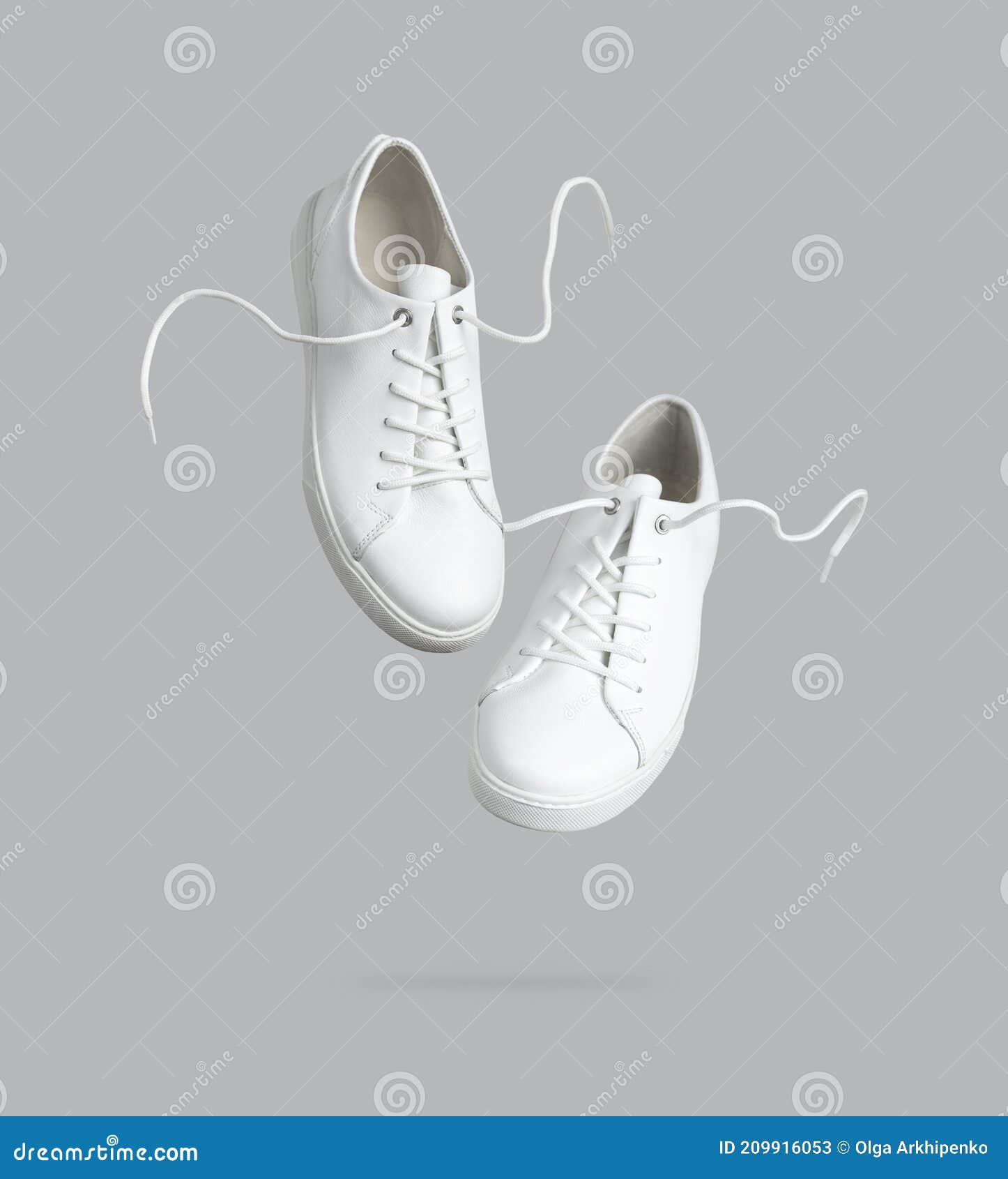 Flying White Leather Womens Sneakers Isolated on Gray Background ...