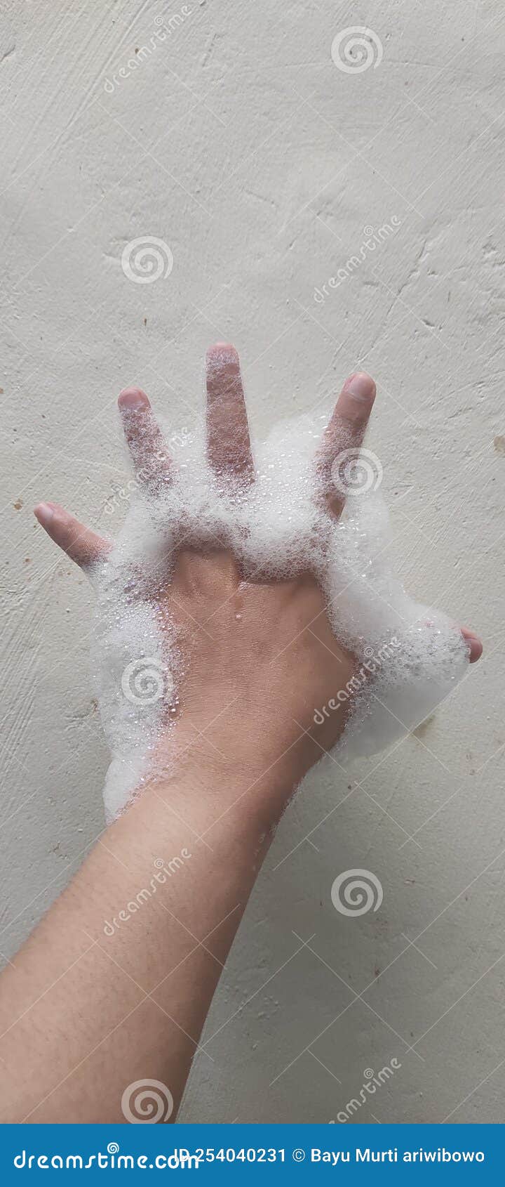 Foam on hand with bubbles, stock image. Image of nose 254040231