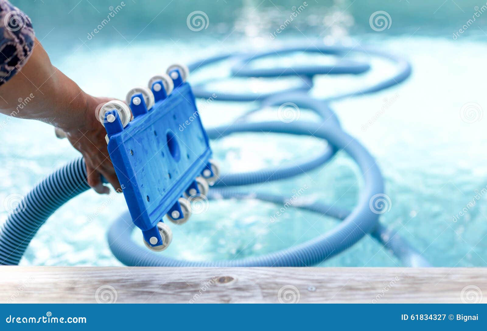Focus on Front Roller of Equipment Cleaning Swimming Pool Stock Image