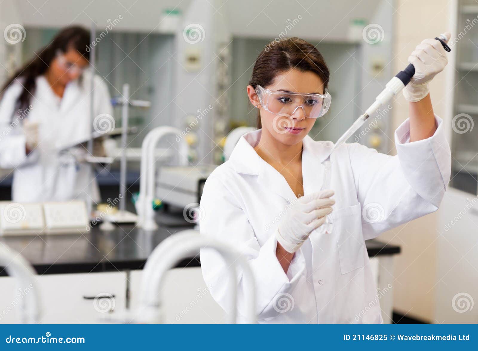 Focus Student Pouring Liquid in a Tube Stock Image Image of liquid