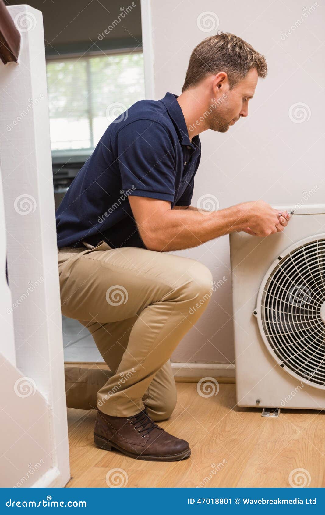 Focused Handyman Fixing Air Conditioning Stock Image Image of